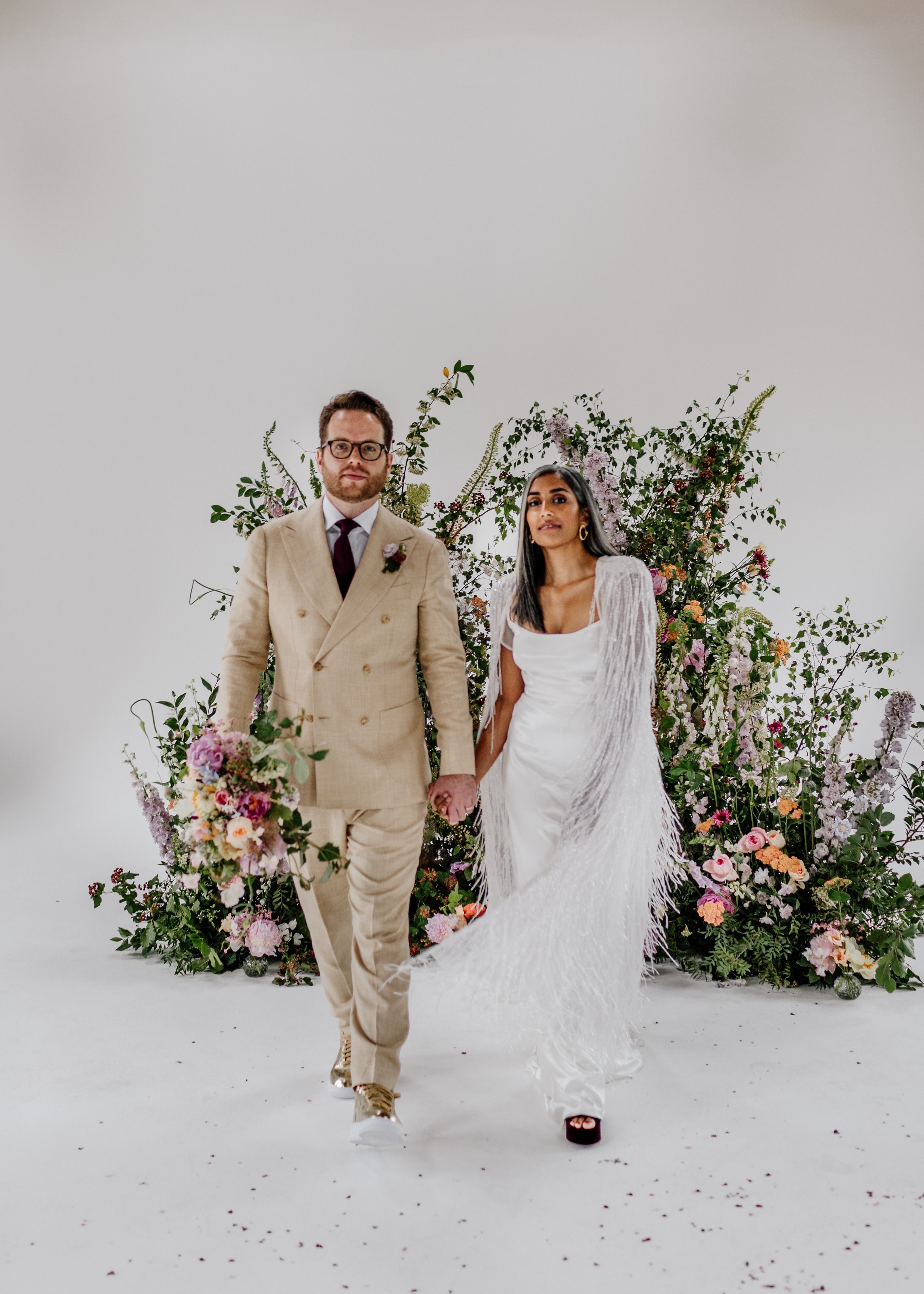 Beautiful bride Rebecca wore a wedding dress and beaded cape by Halfpenny London