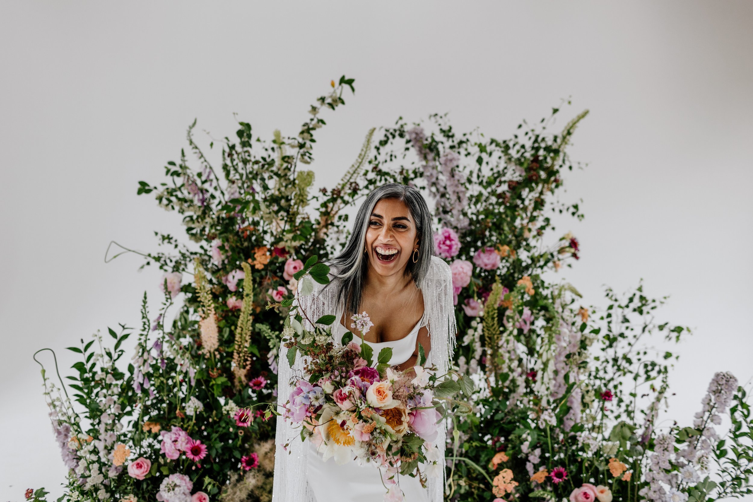 Beautiful bride Rebecca wore a wedding dress and beaded cape by Halfpenny London