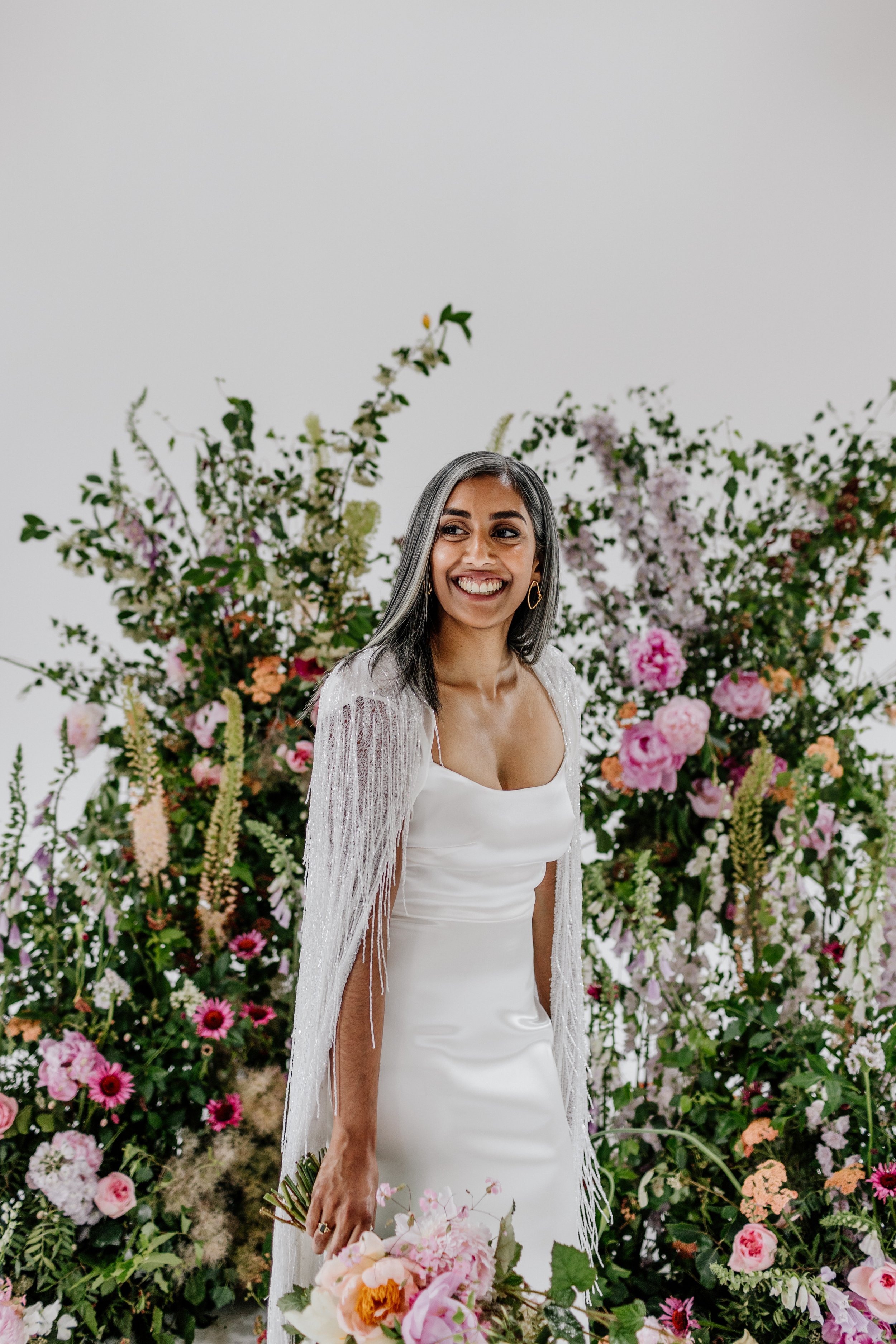 Beautiful bride Rebecca wore a wedding dress and beaded cape by Halfpenny London