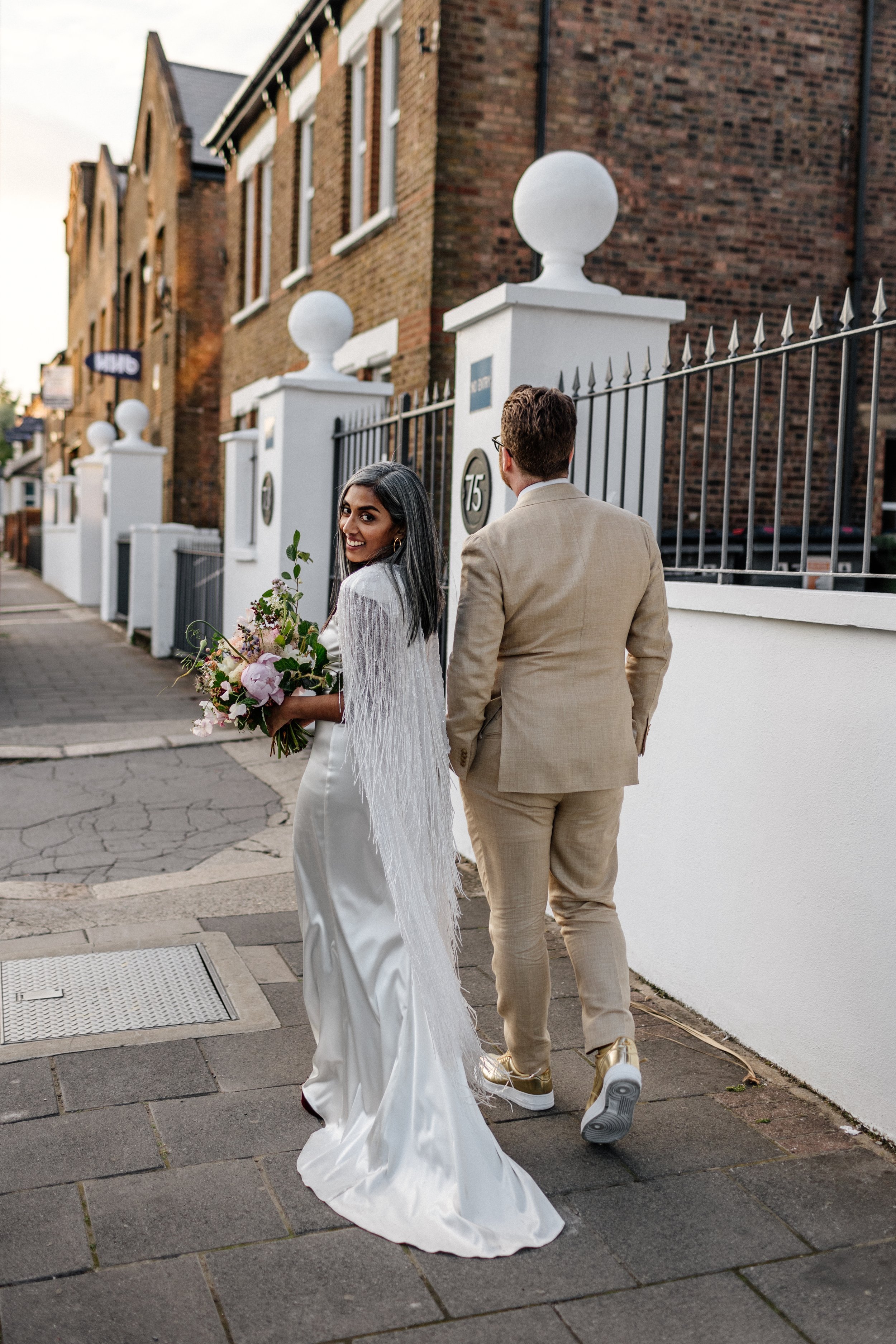 Beautiful bride Rebecca wore a wedding dress and beaded cape by Halfpenny London