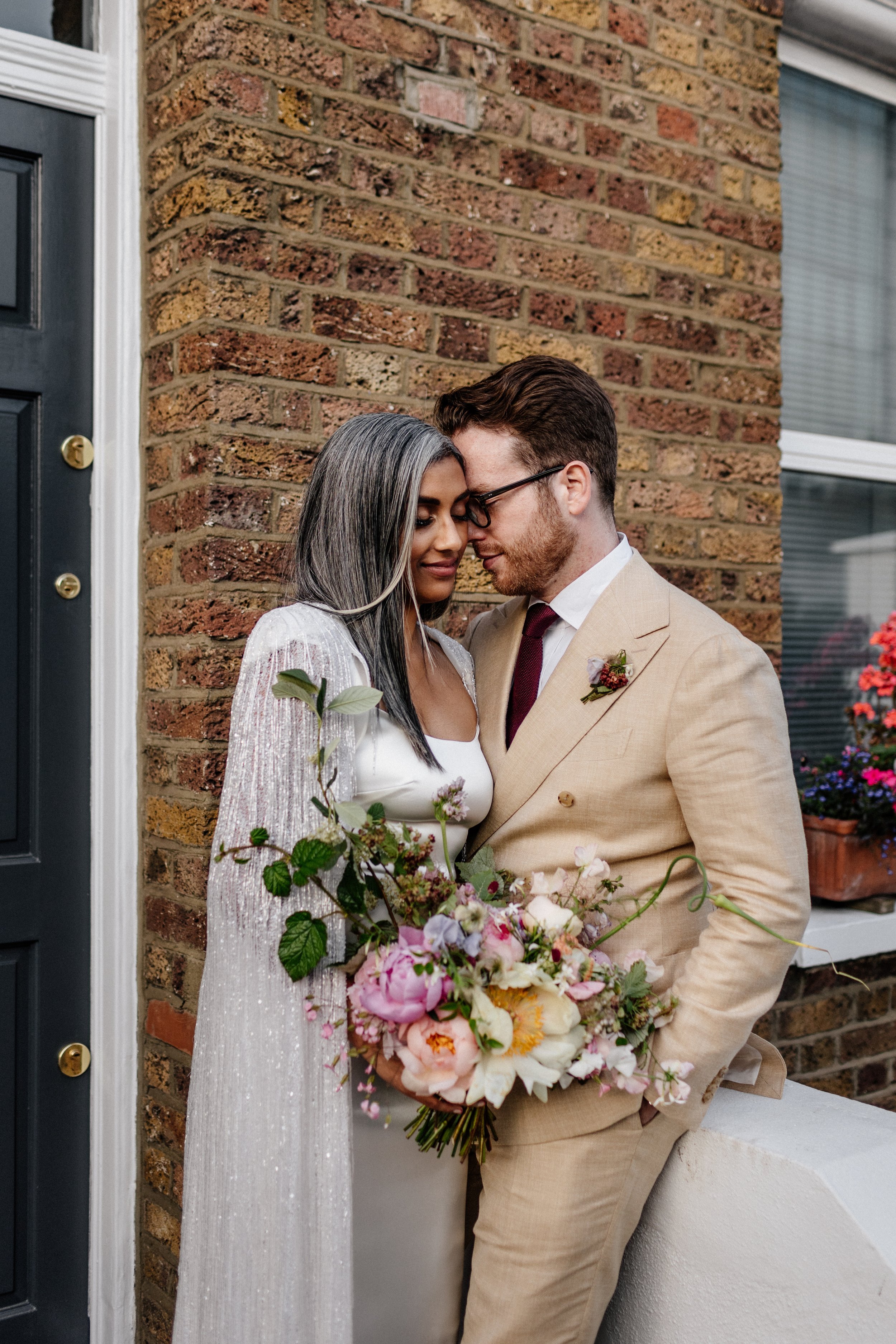 Beautiful bride Rebecca wore a wedding dress and beaded cape by Halfpenny London