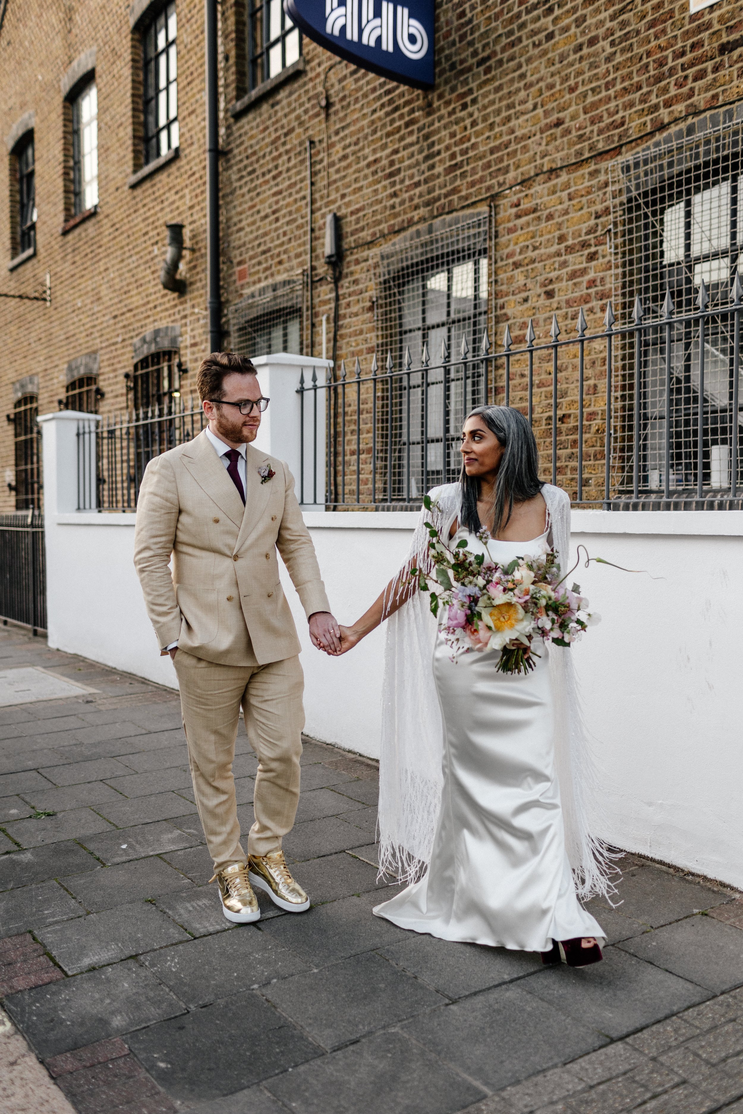 Beautiful bride Rebecca wore a wedding dress and beaded cape by Halfpenny London