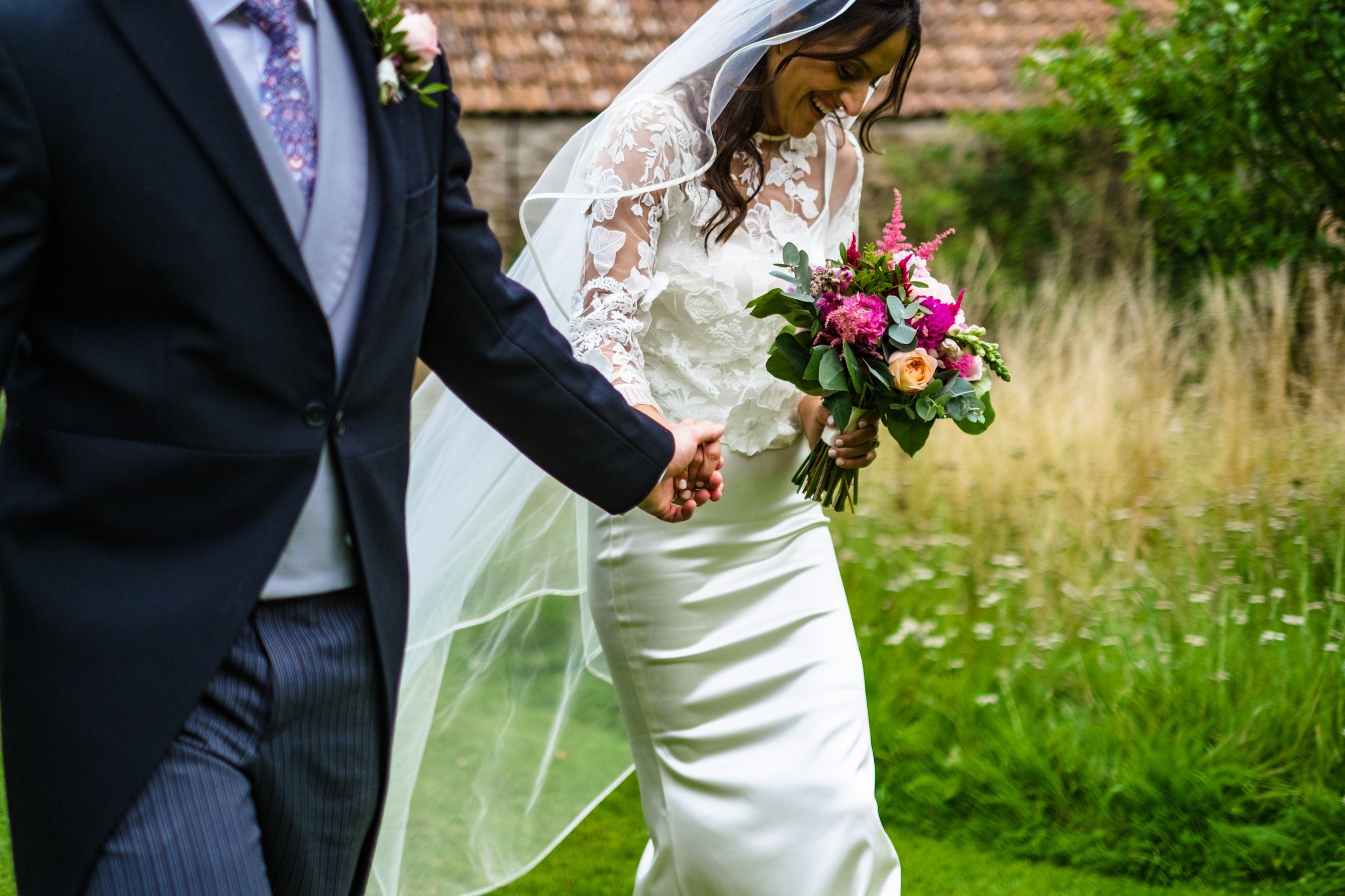 Beautiful bride Emily wore a wedding dress by Halfpenny London