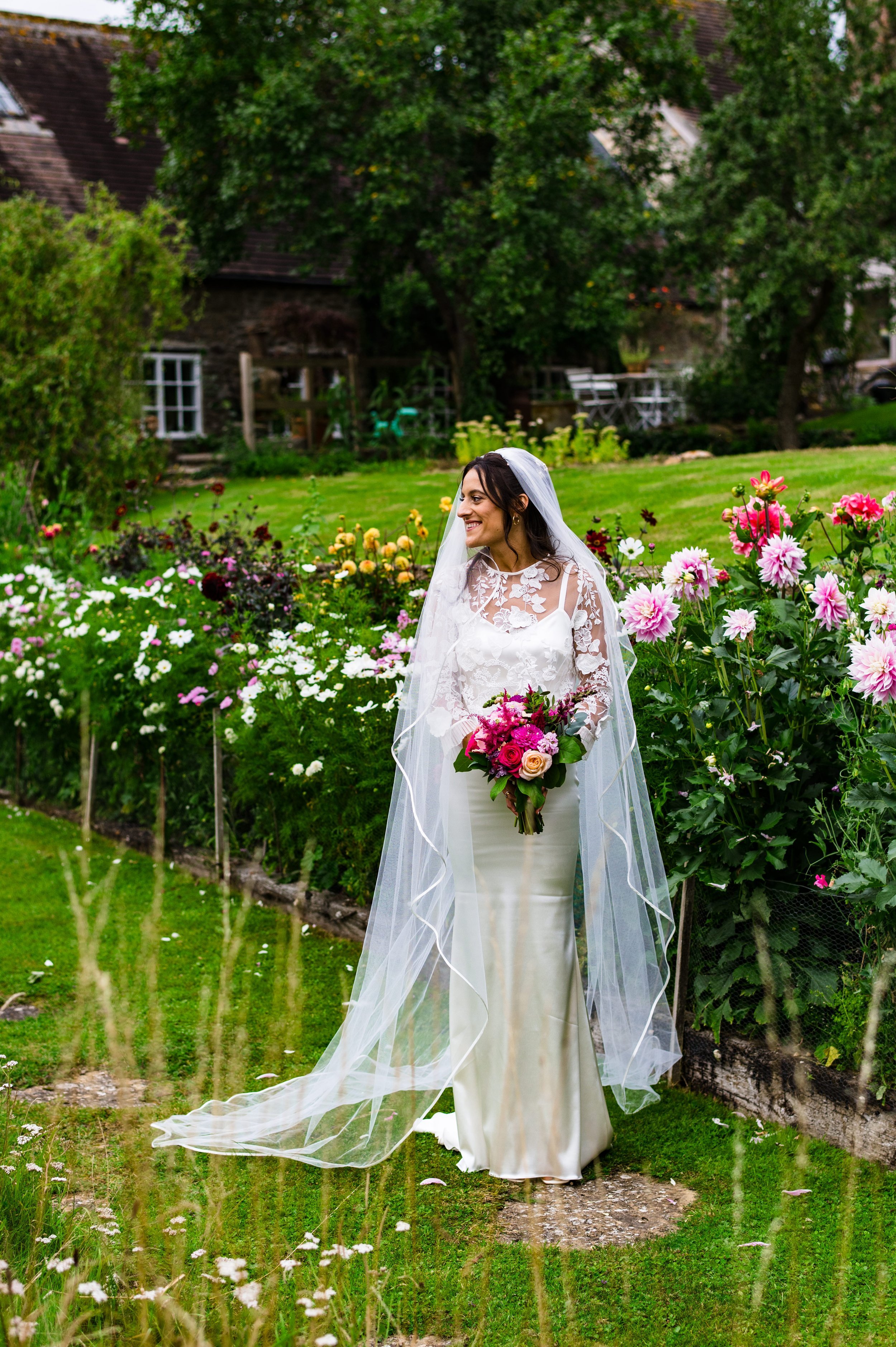 Beautiful bride Emily wore a wedding dress by Halfpenny London