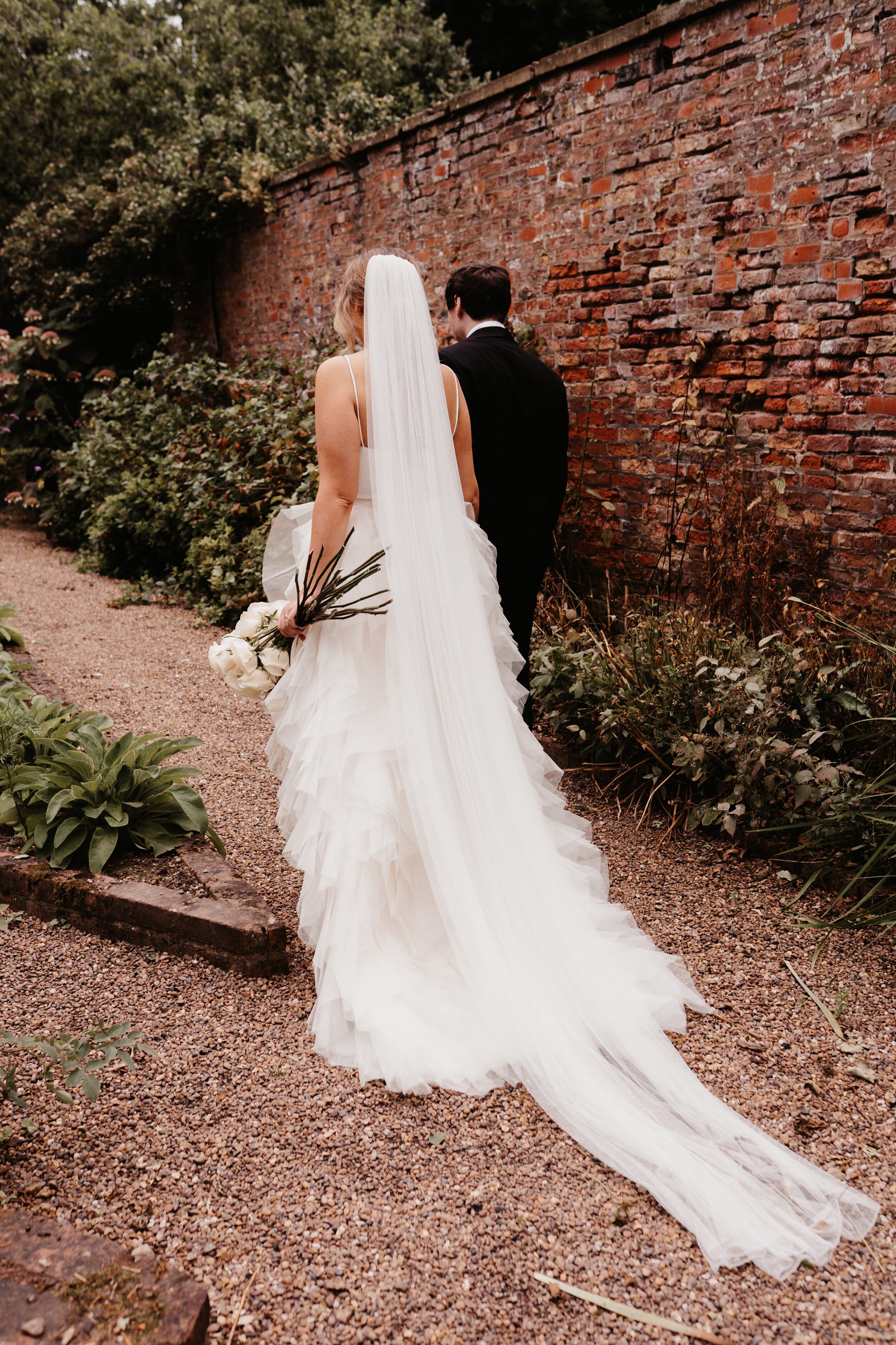 Beautiful bride Sarah wore a wedding dress by Halfpenny London