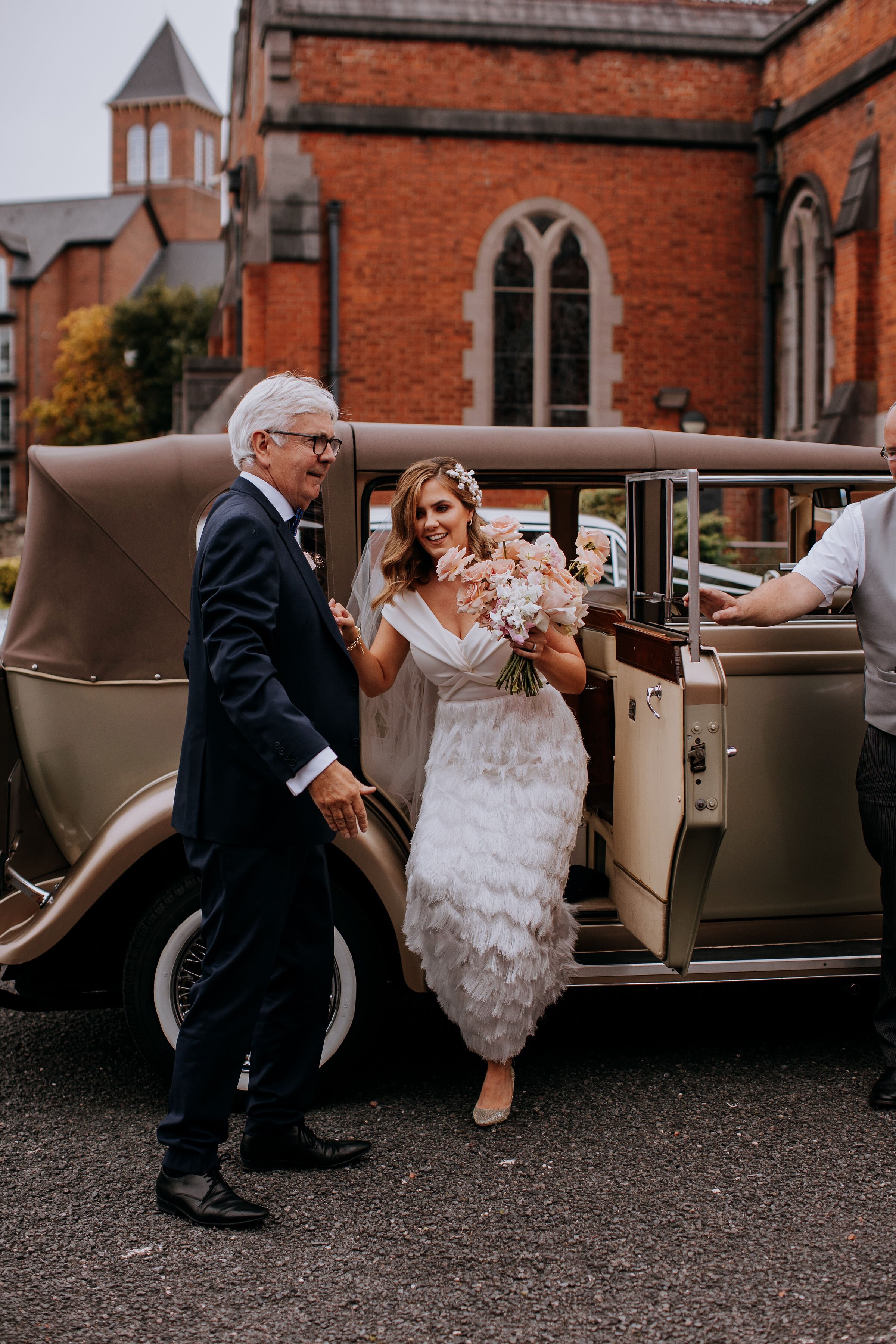 Beautiful bride Emma wore a wedding dress by Halfpenny London