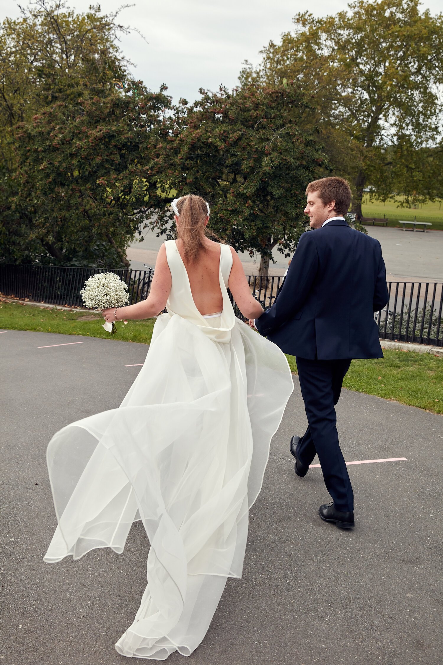 Beautiful bride Caroline wore bridal separates, trousers and an overskirt by Halfpenny London