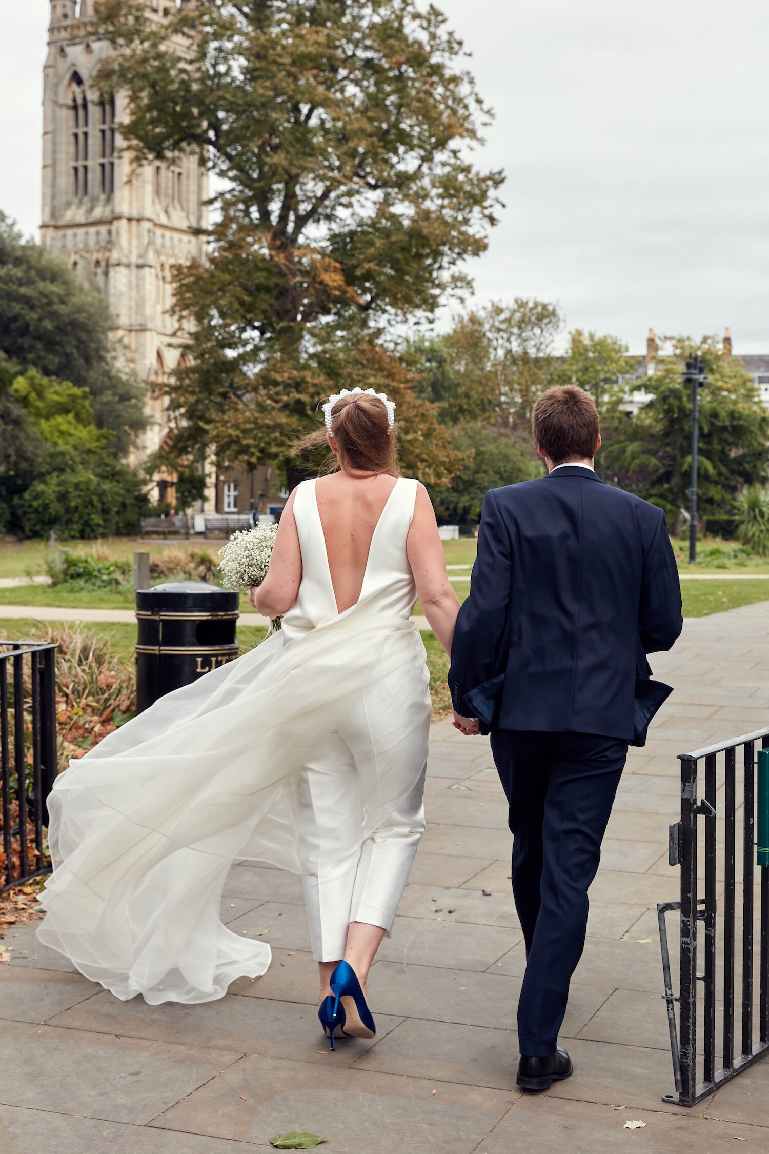 Beautiful bride Caroline wore bridal separates, trousers and an overskirt by Halfpenny London