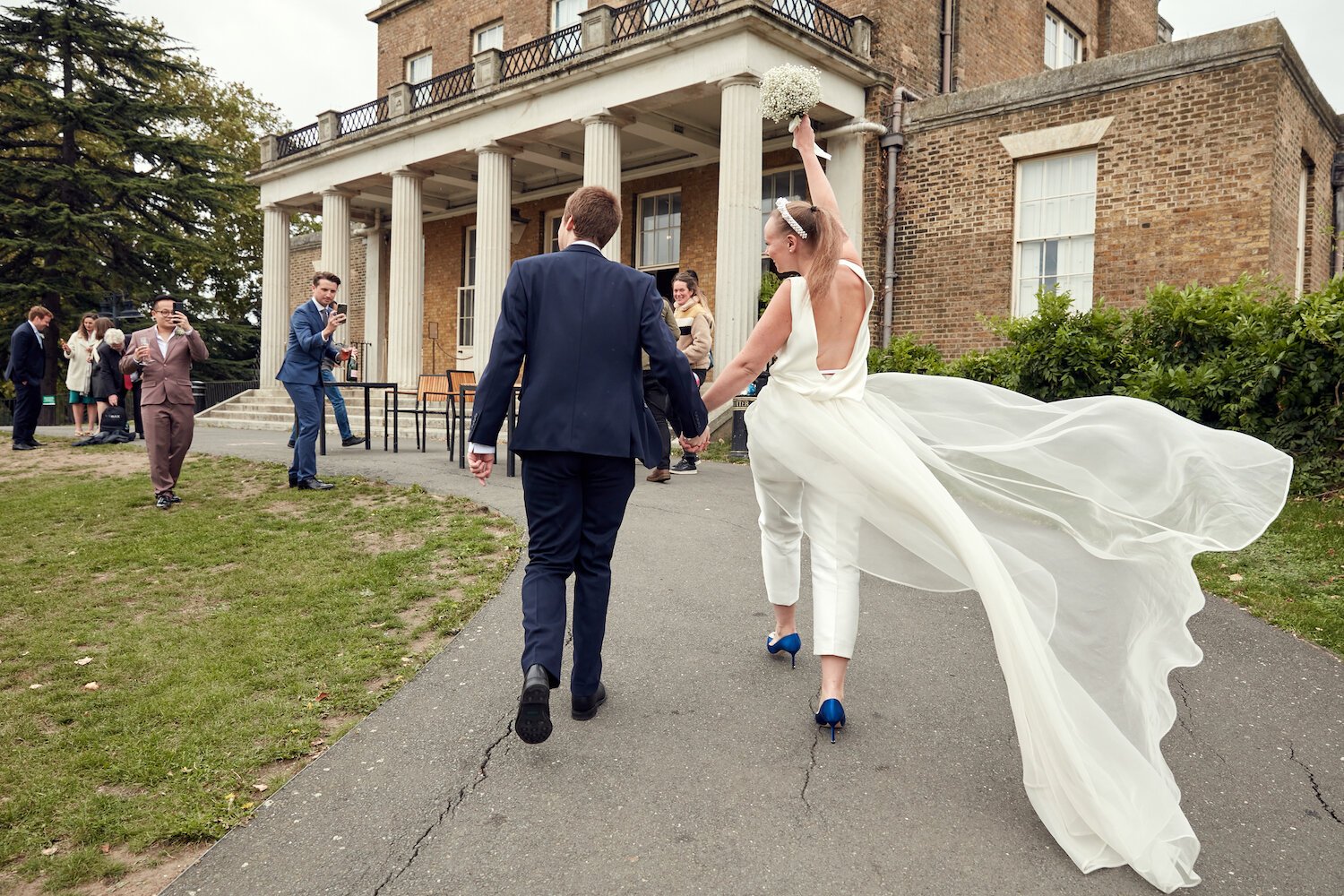 Beautiful bride Caroline wore bridal separates, trousers and an overskirt by Halfpenny London