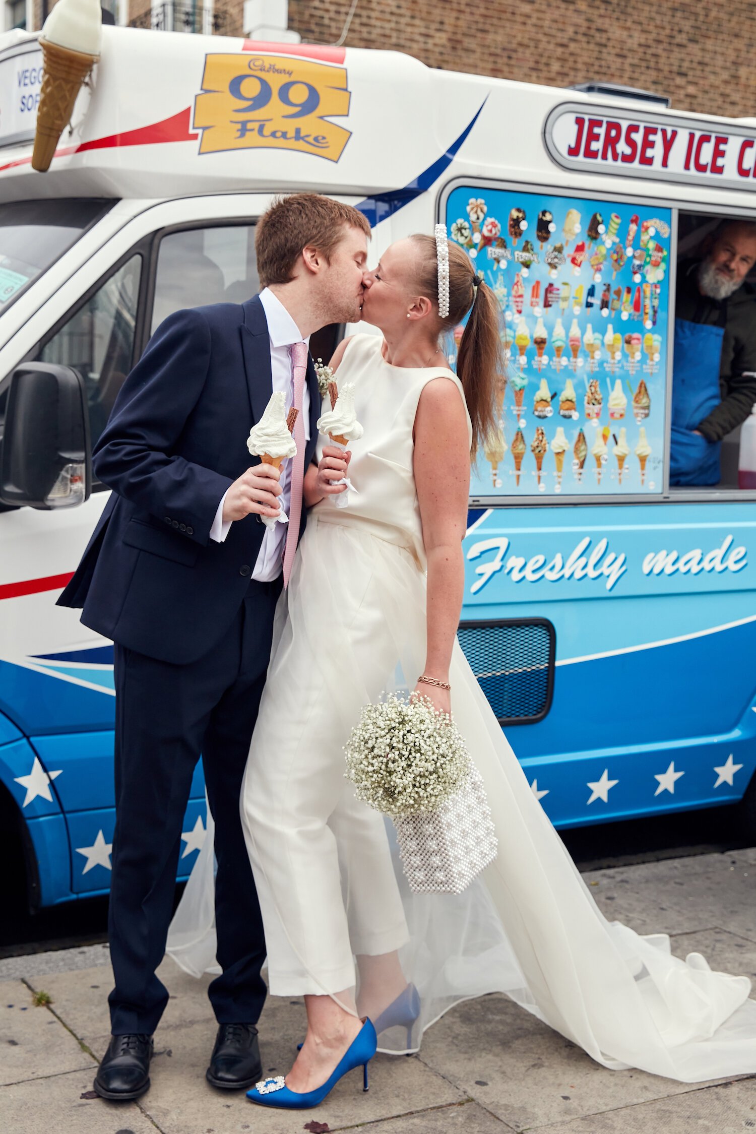 Beautiful bride Caroline wore bridal separates, trousers and an overskirt by Halfpenny London