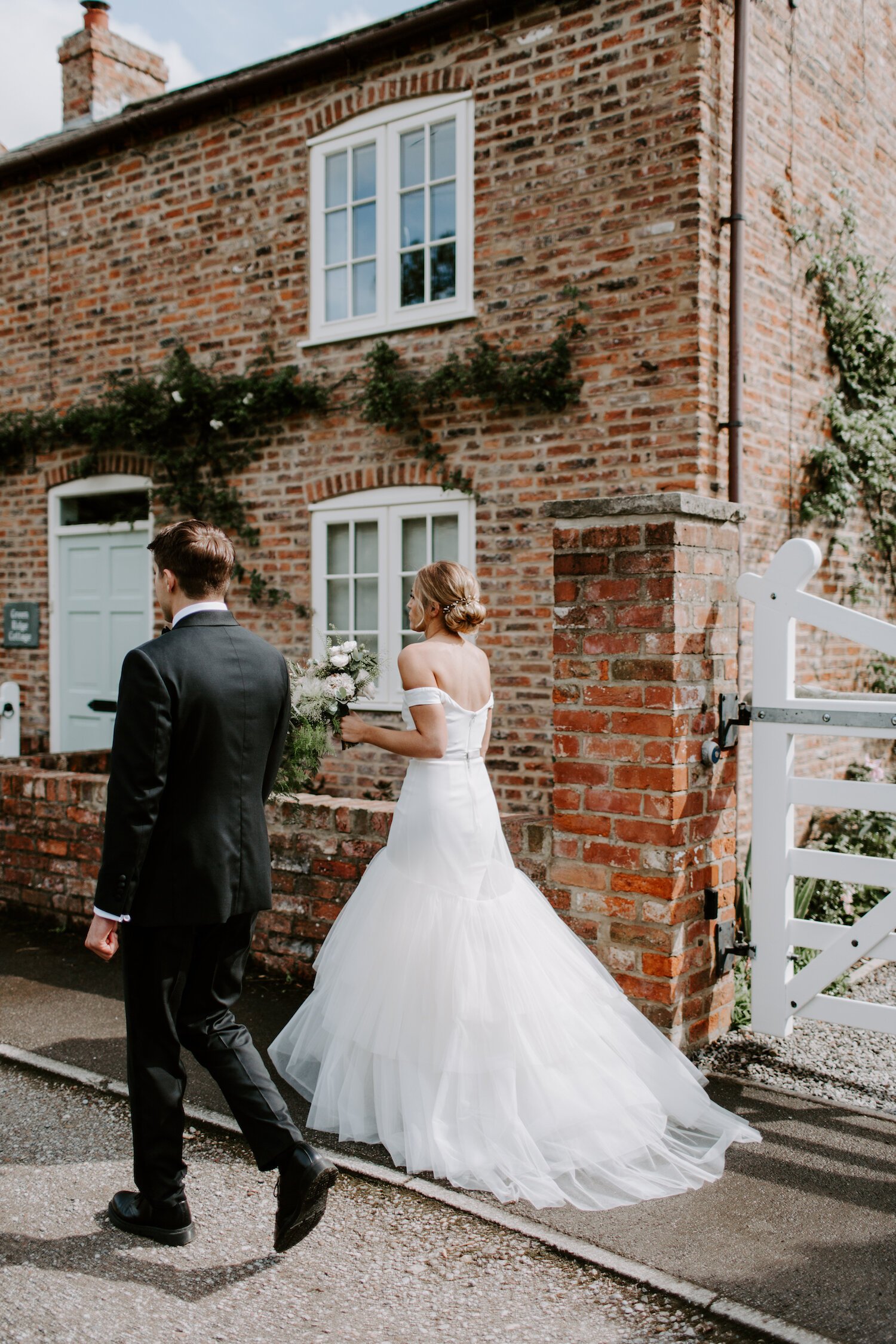 Beautiful bride Poppy wore a wedding dress by Halfpenny London