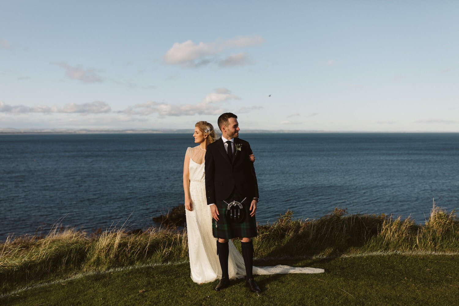 Beautiful bride Jo wore a wedding dress by Halfpenny London