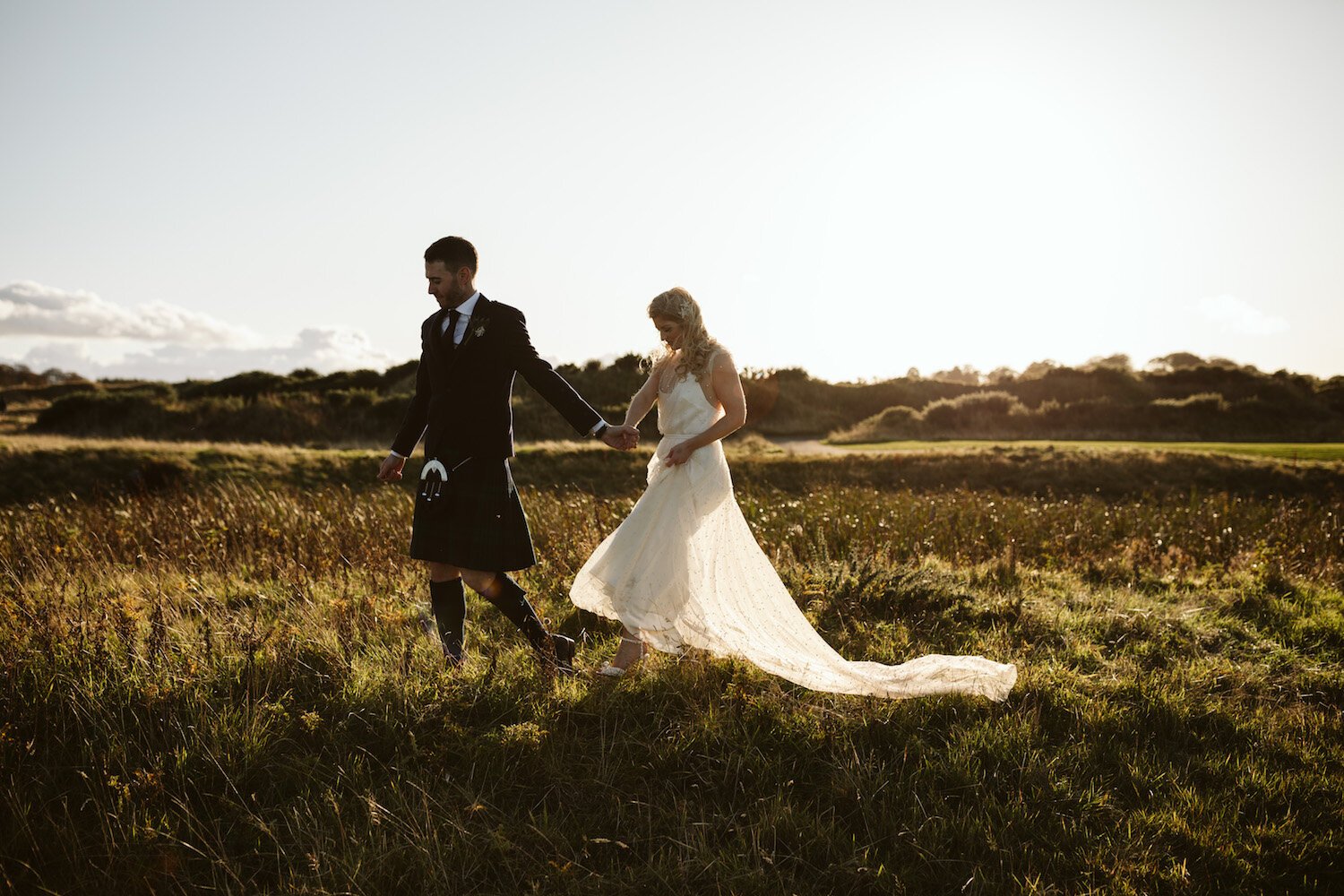 Beautiful bride Jo wore a wedding dress by Halfpenny London