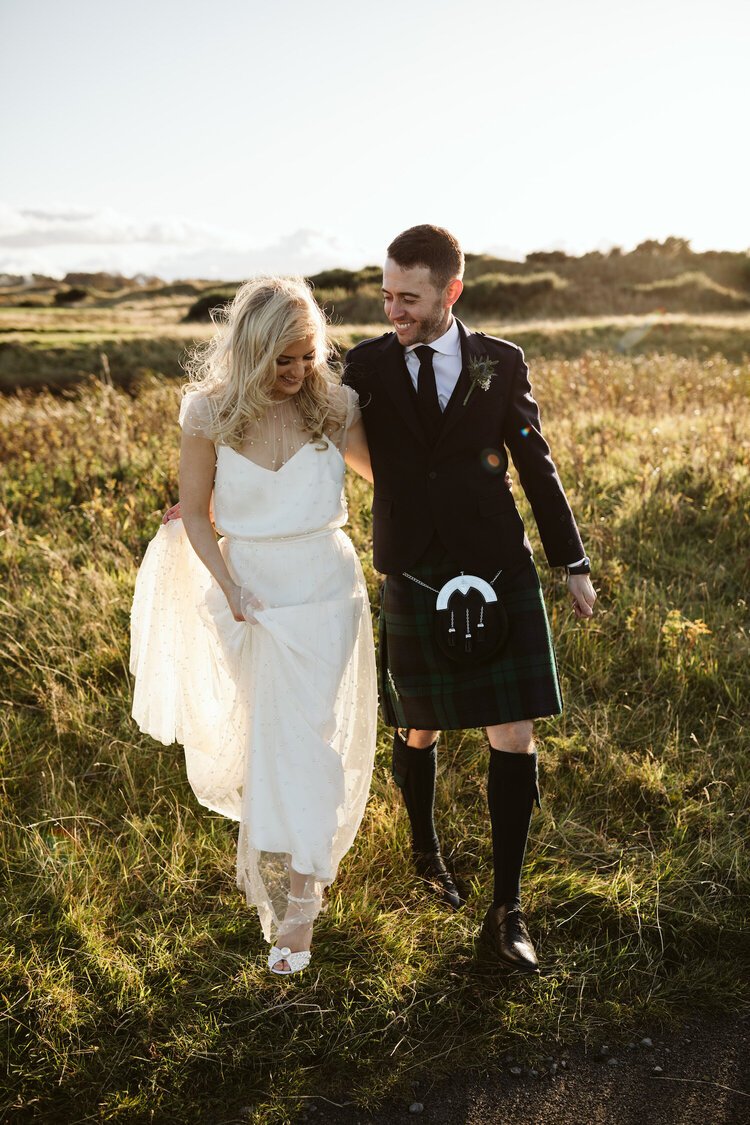 Beautiful bride Jo wore a wedding dress by Halfpenny London