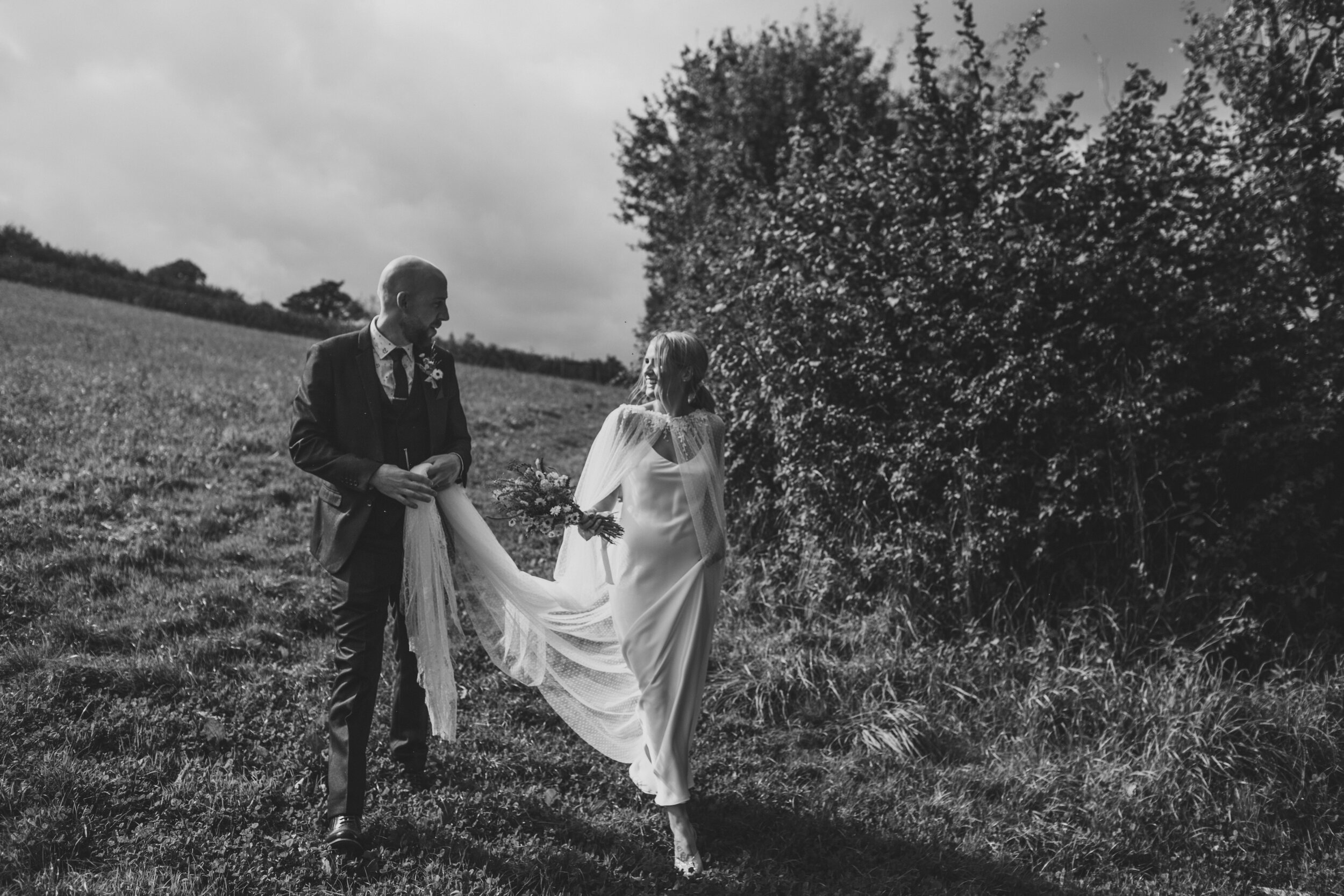 Beautiful bride Emily wore a wedding dress by Halfpenny London