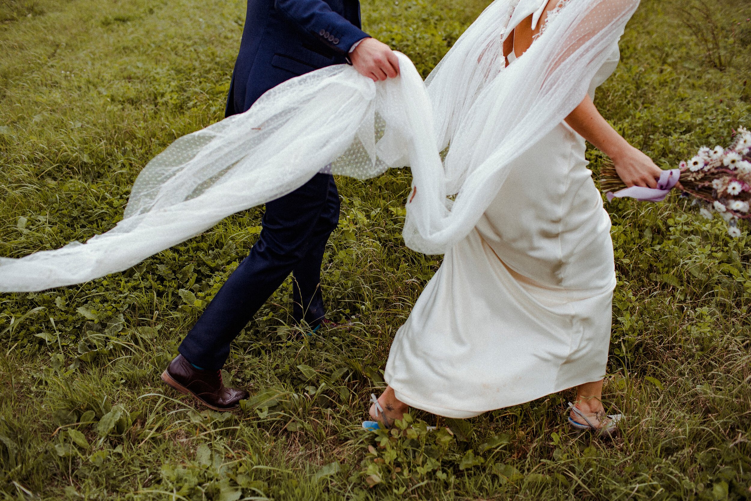 Beautiful bride Emily wore a wedding dress by Halfpenny London