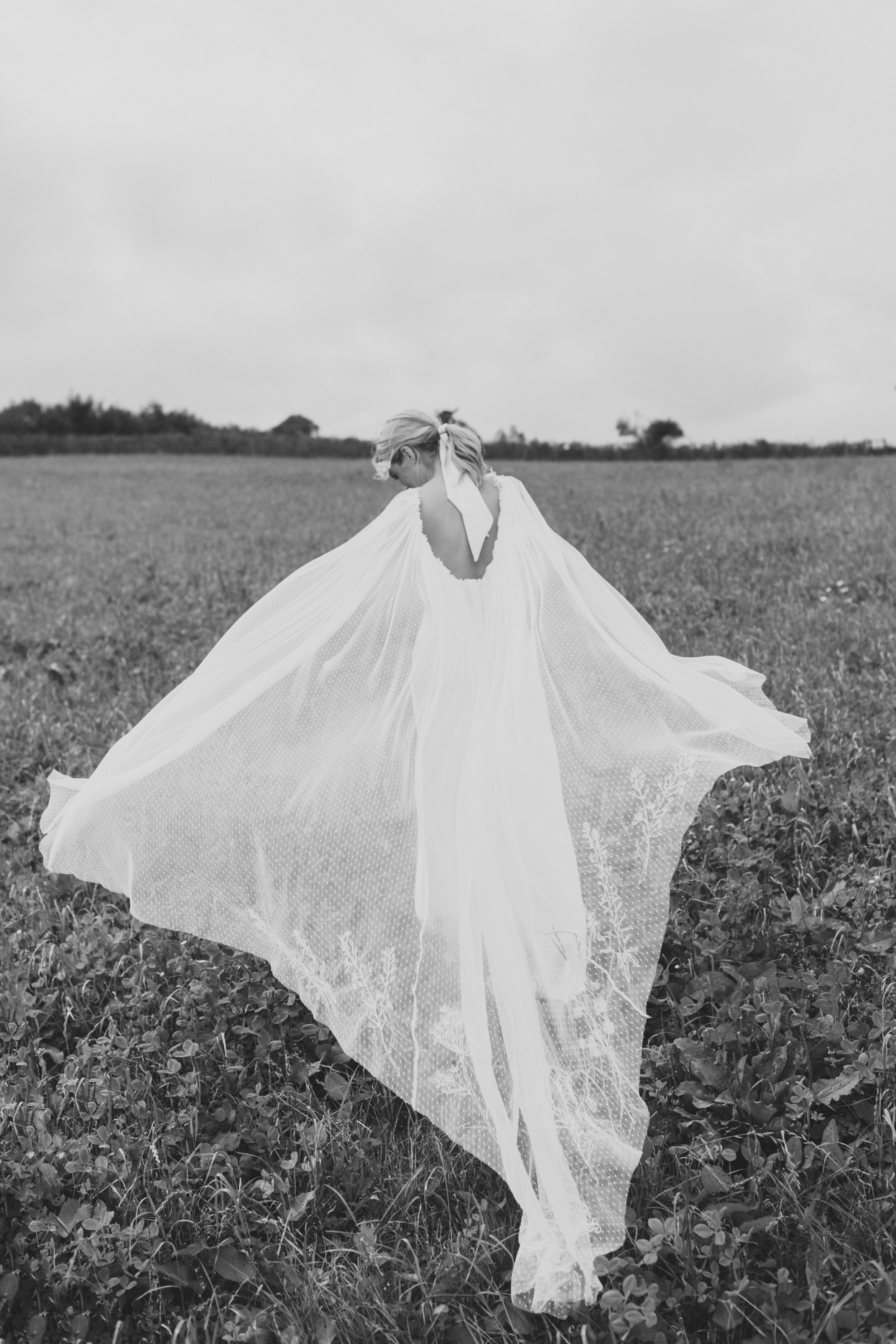 Beautiful bride Emily wore a wedding dress by Halfpenny London