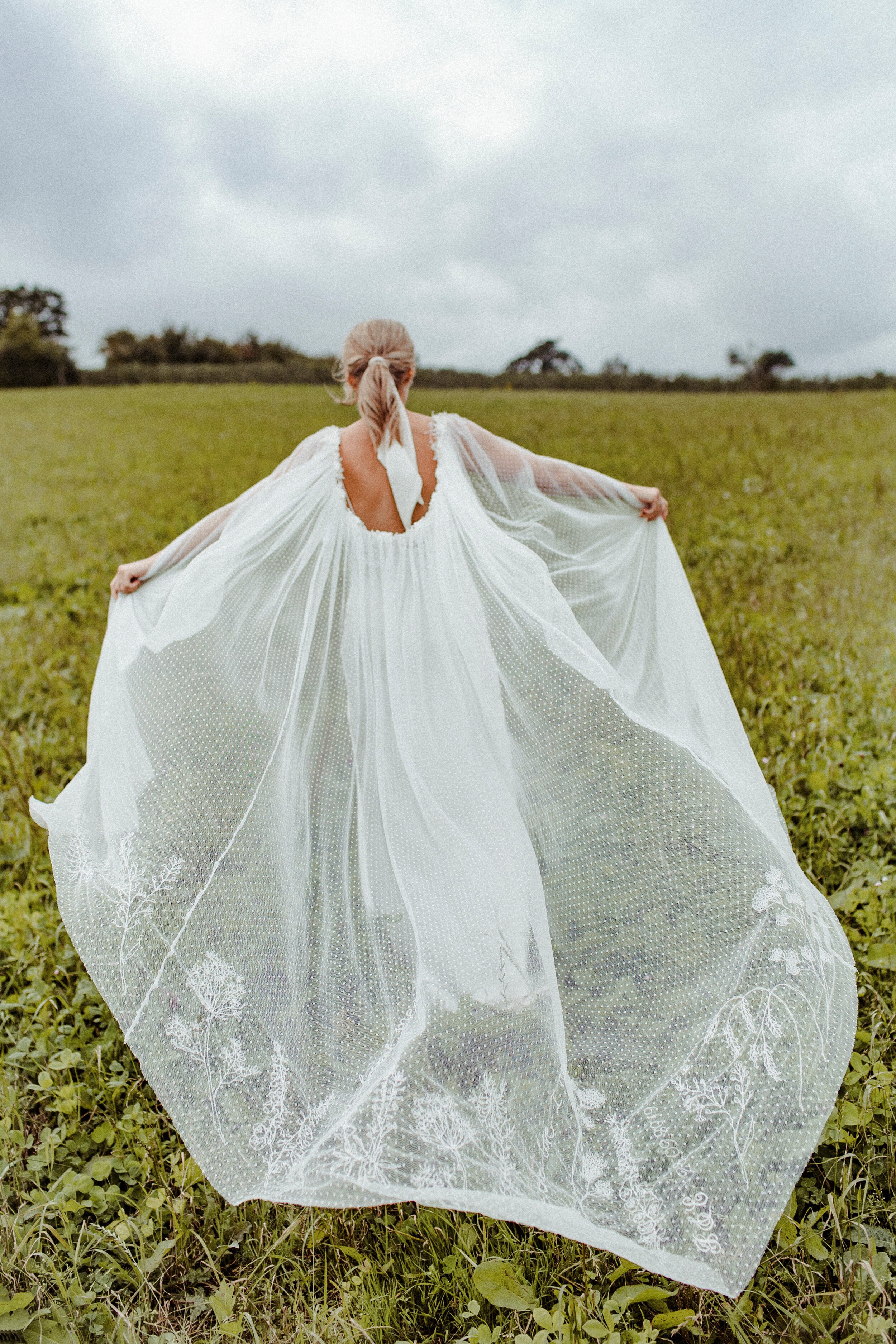 Beautiful bride Emily wore a wedding dress by Halfpenny London