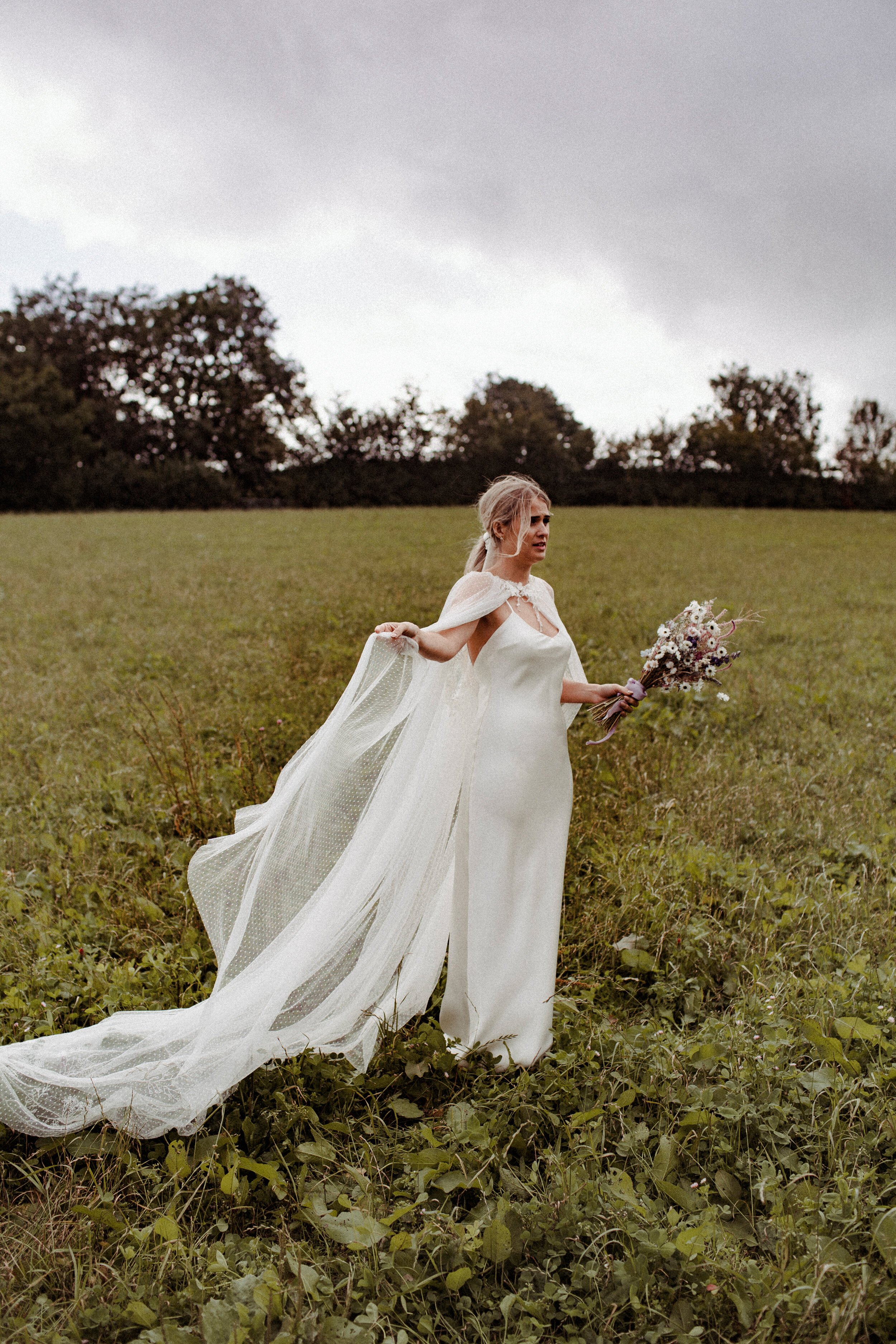 Beautiful bride Emily wore a wedding dress by Halfpenny London