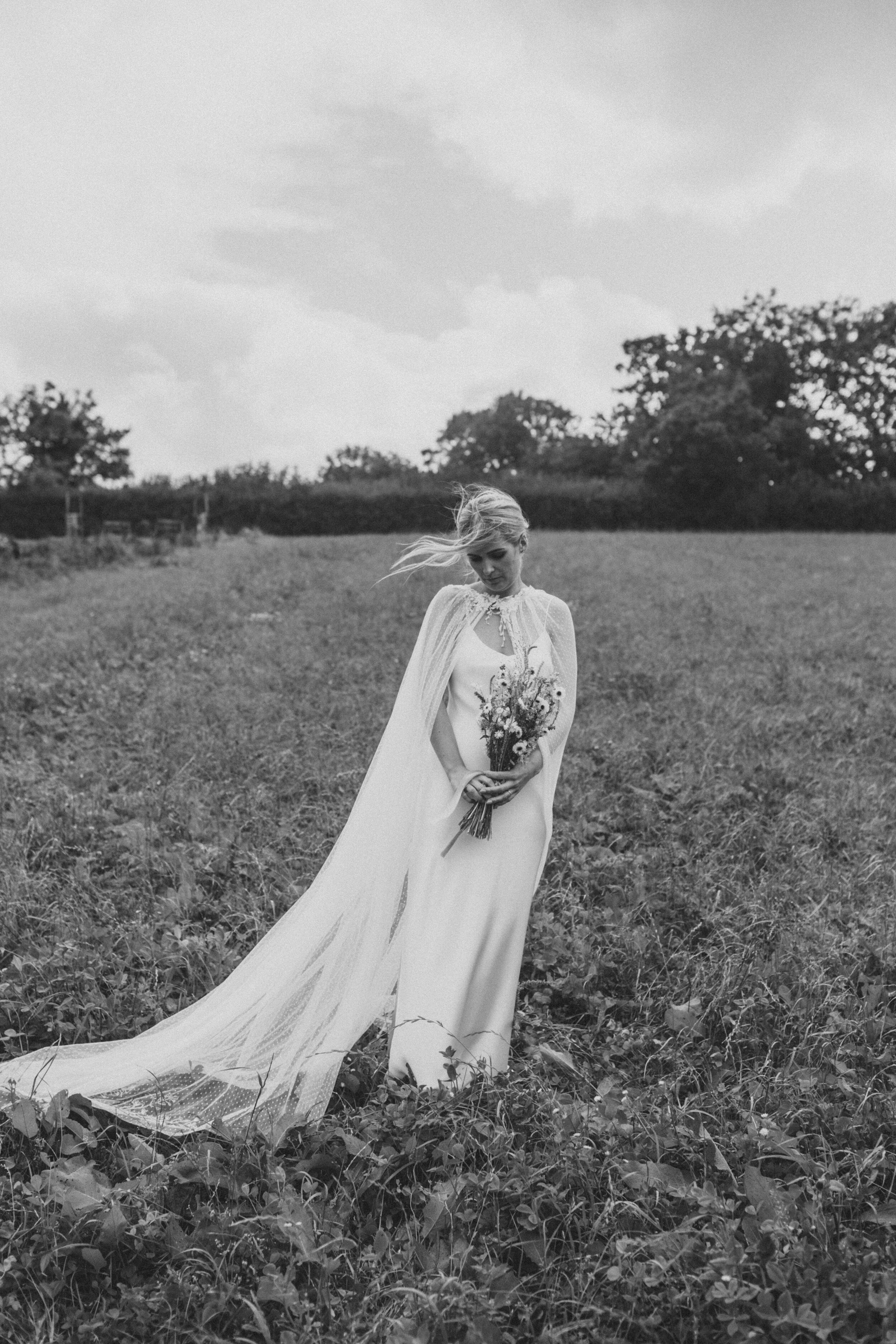 Beautiful bride Emily wore a wedding dress by Halfpenny London