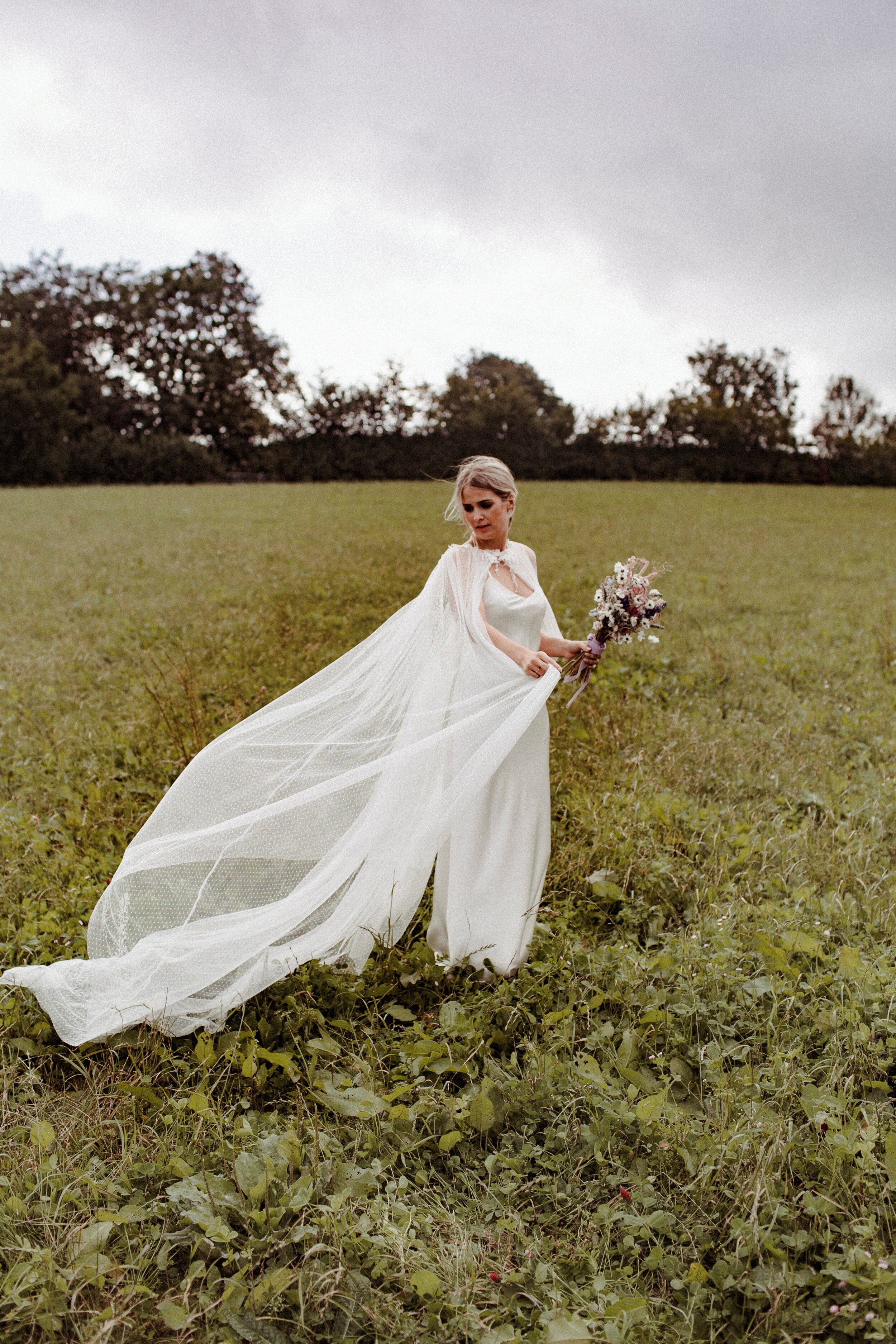 Beautiful bride Emily wore a wedding dress by Halfpenny London