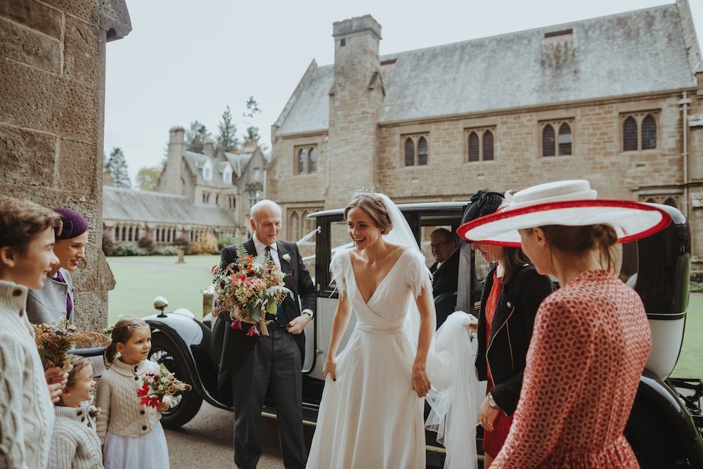 EMMA+SNOW+BALL+DAISY+DRESS+WITH+FETHER+SLEEVES2.jpeg