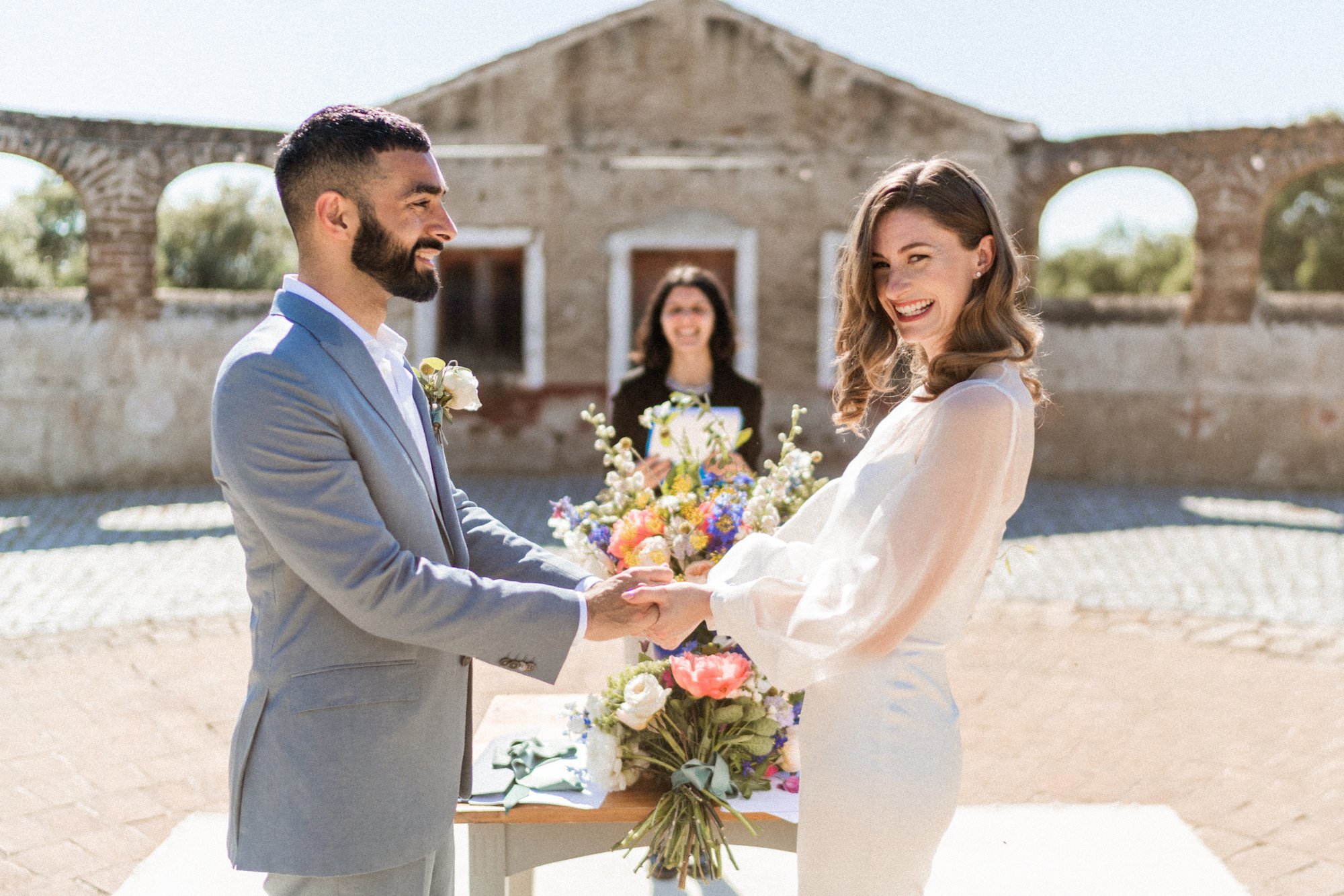 Beautiful bride Genevieve wore a wedding dress and a sheer top with statement sleeves by Halfpenny London