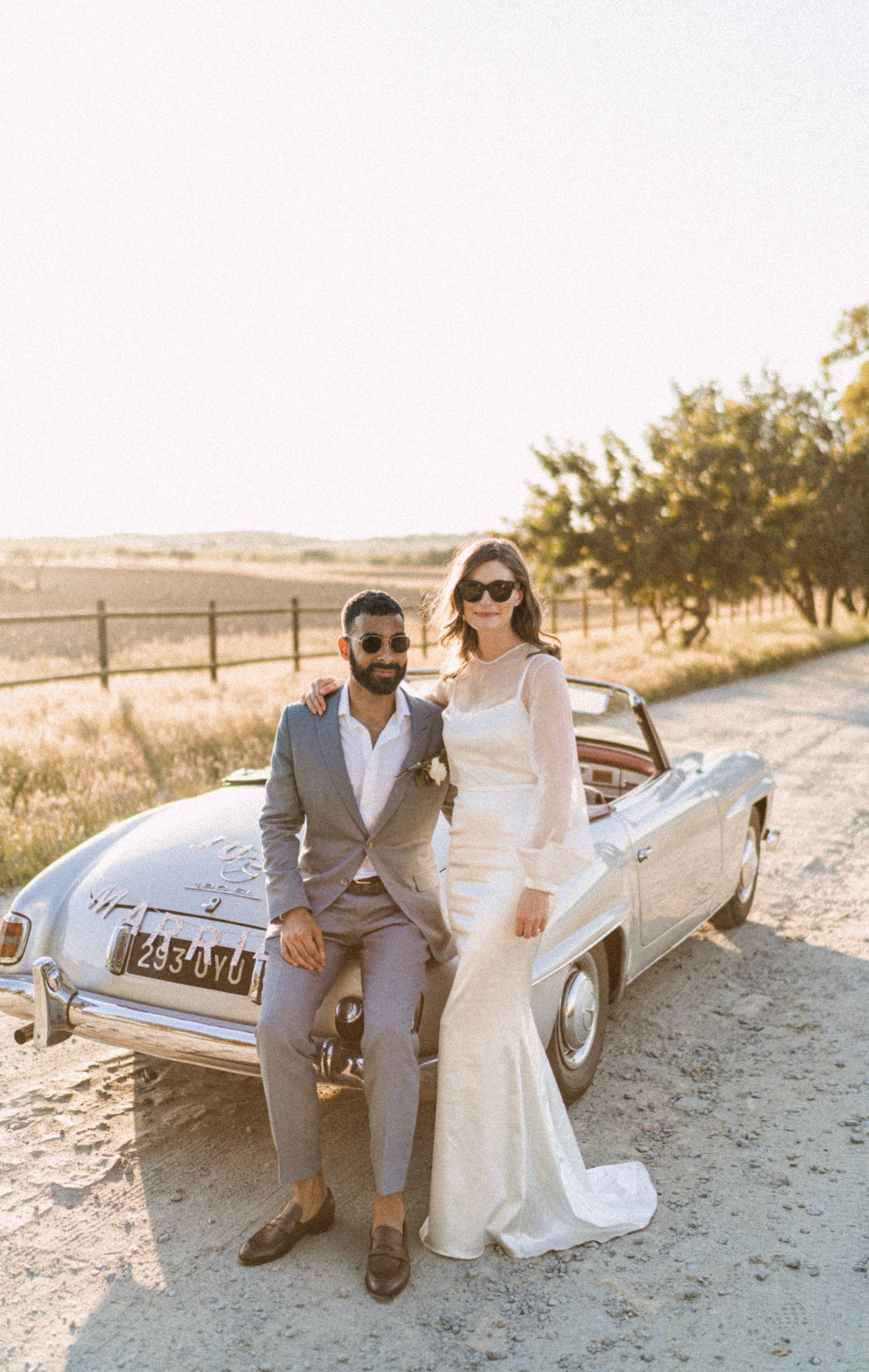 Beautiful bride Genevieve wore a wedding dress and a sheer top with statement sleeves by Halfpenny London