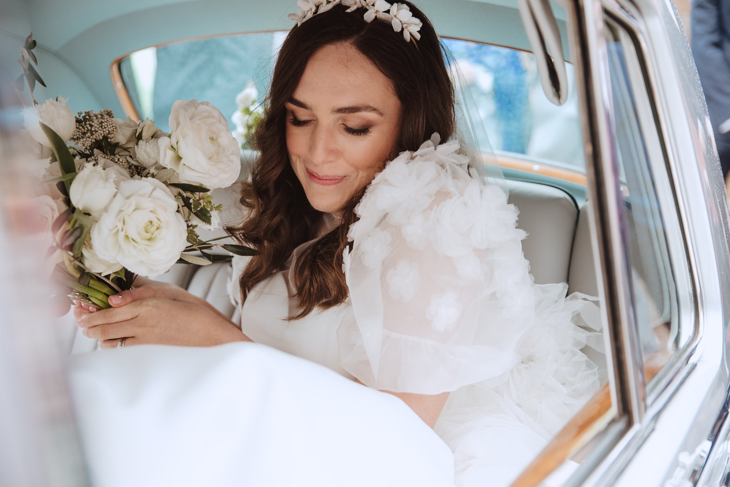 Beautiful bride Olivia wore a top and veil by Halfpenny London