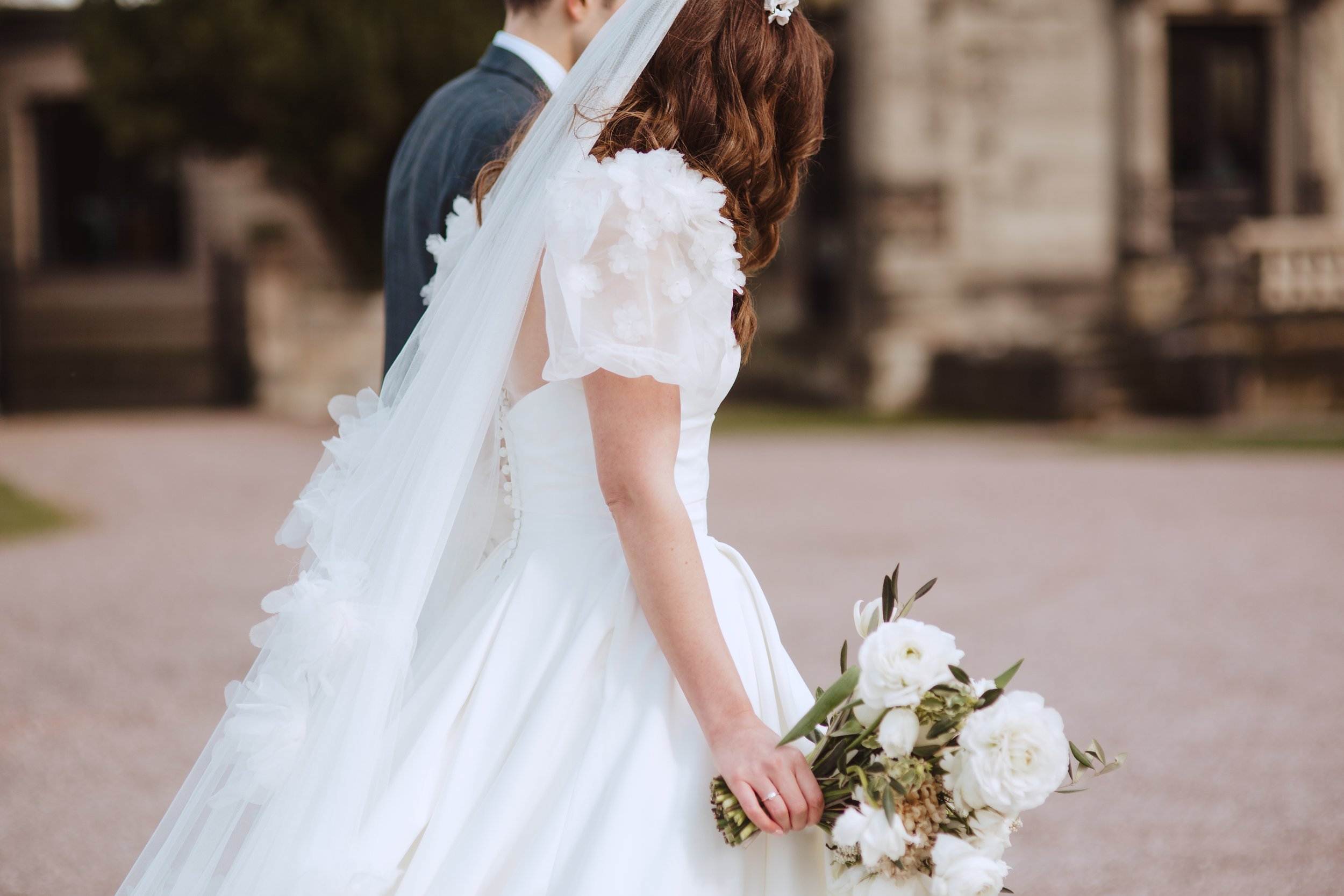 Beautiful bride Olivia wore a top and veil by Halfpenny London