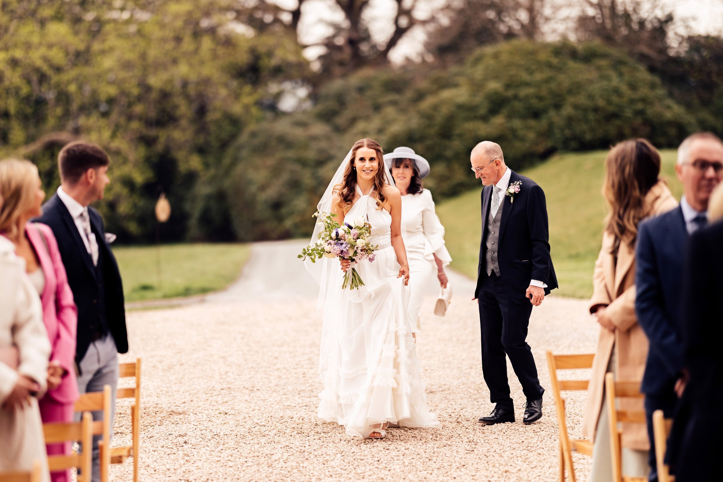 Beautiful bride Charlotte wore a wedding dress by Halfpenny London | Cedar dress and Mayfair sheer skirt