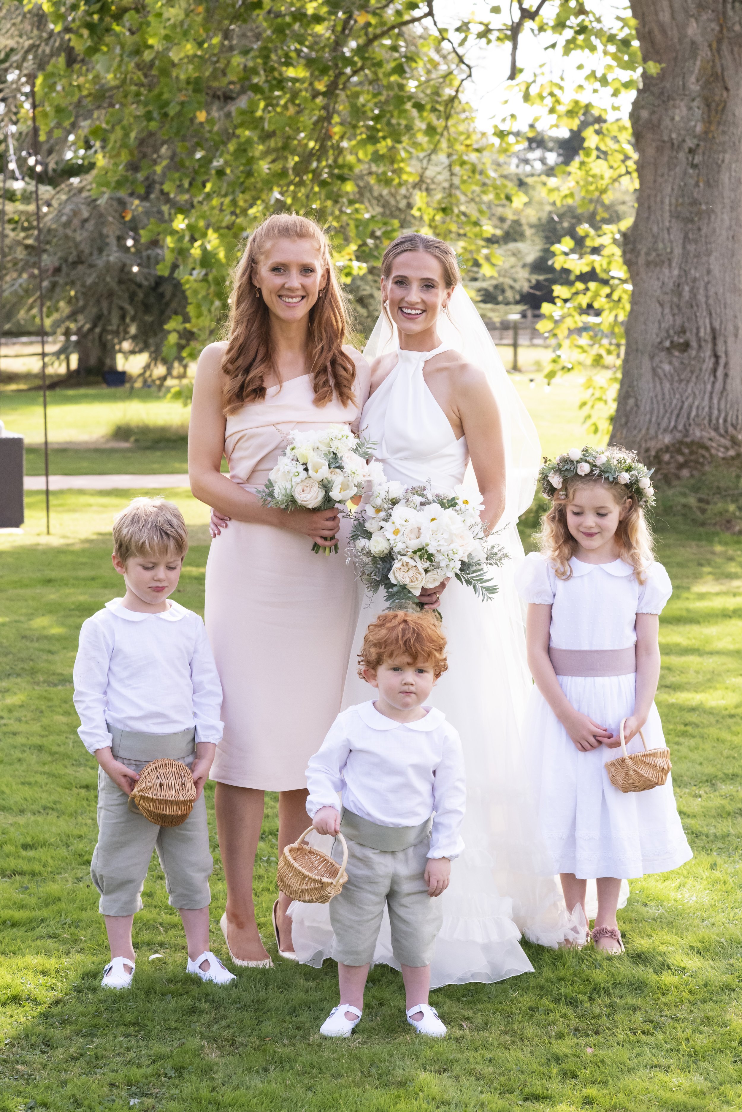 Beautiful bride Izzy wears the Cheryl dress with the Mayfair Skirt by Halfpenny London