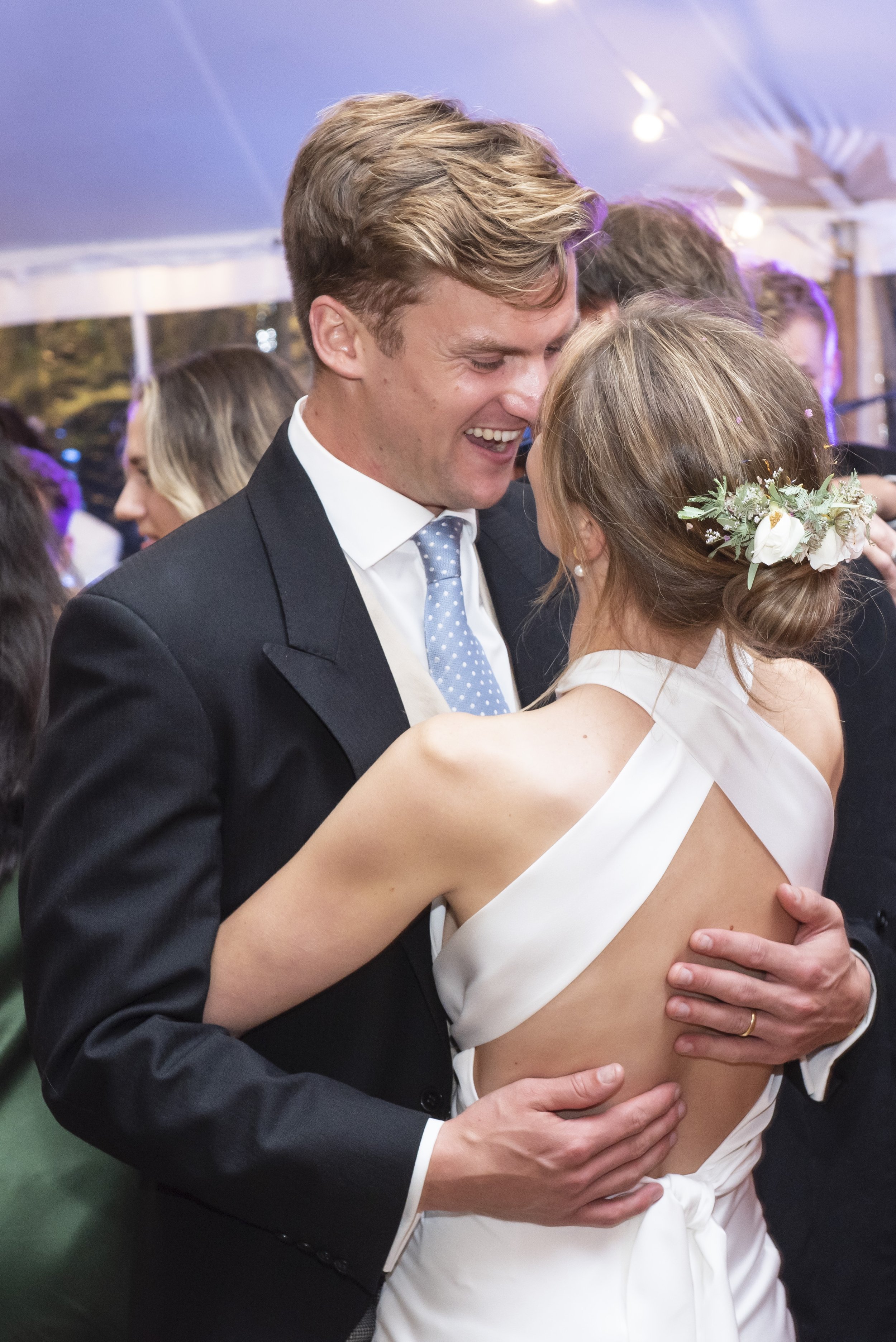 Beautiful bride Izzy wears the Cheryl dress with the Mayfair Skirt by Halfpenny London