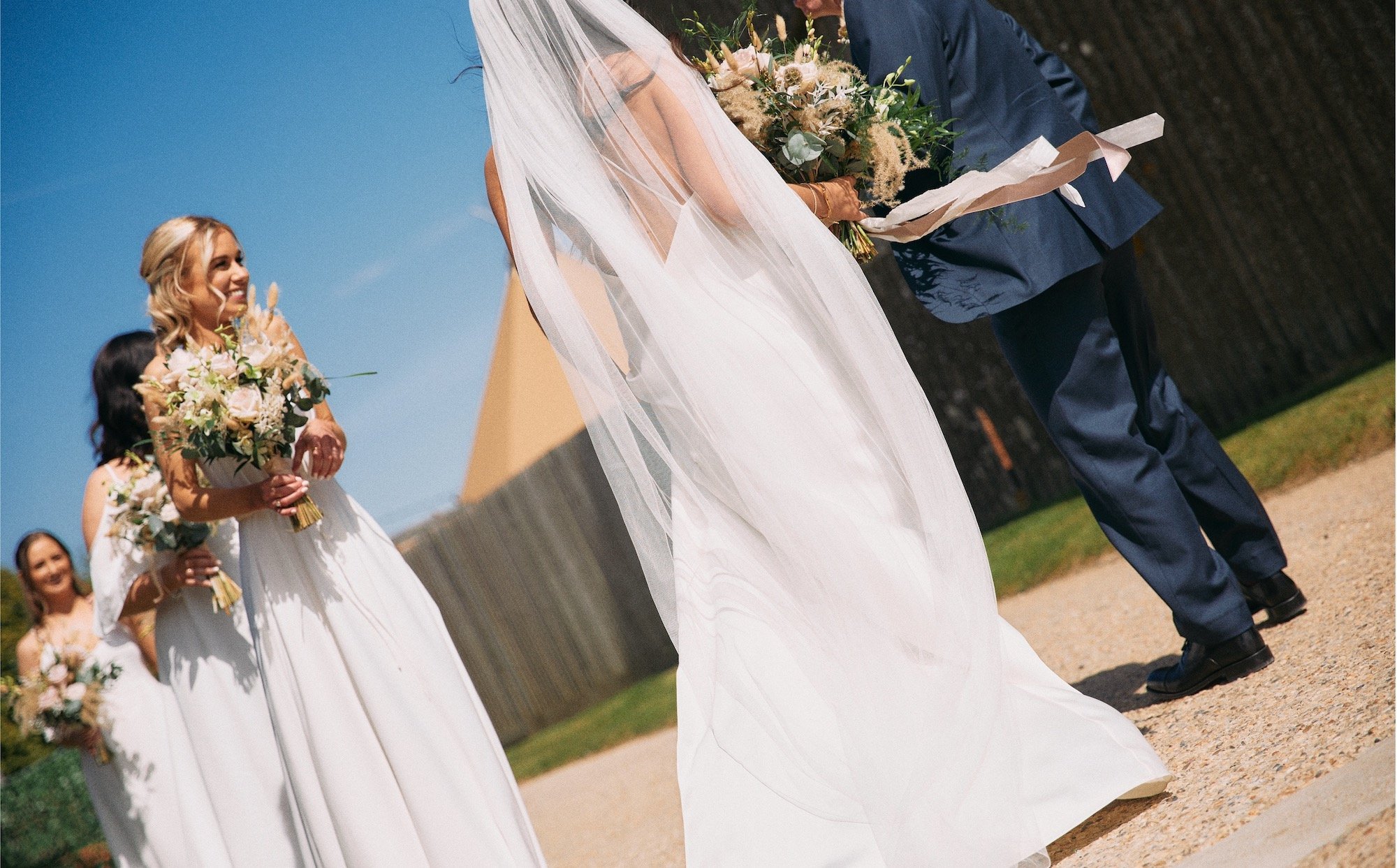 Beautiful bride Frankkey wears Max slip dress by British bridal designer Halfpenny London