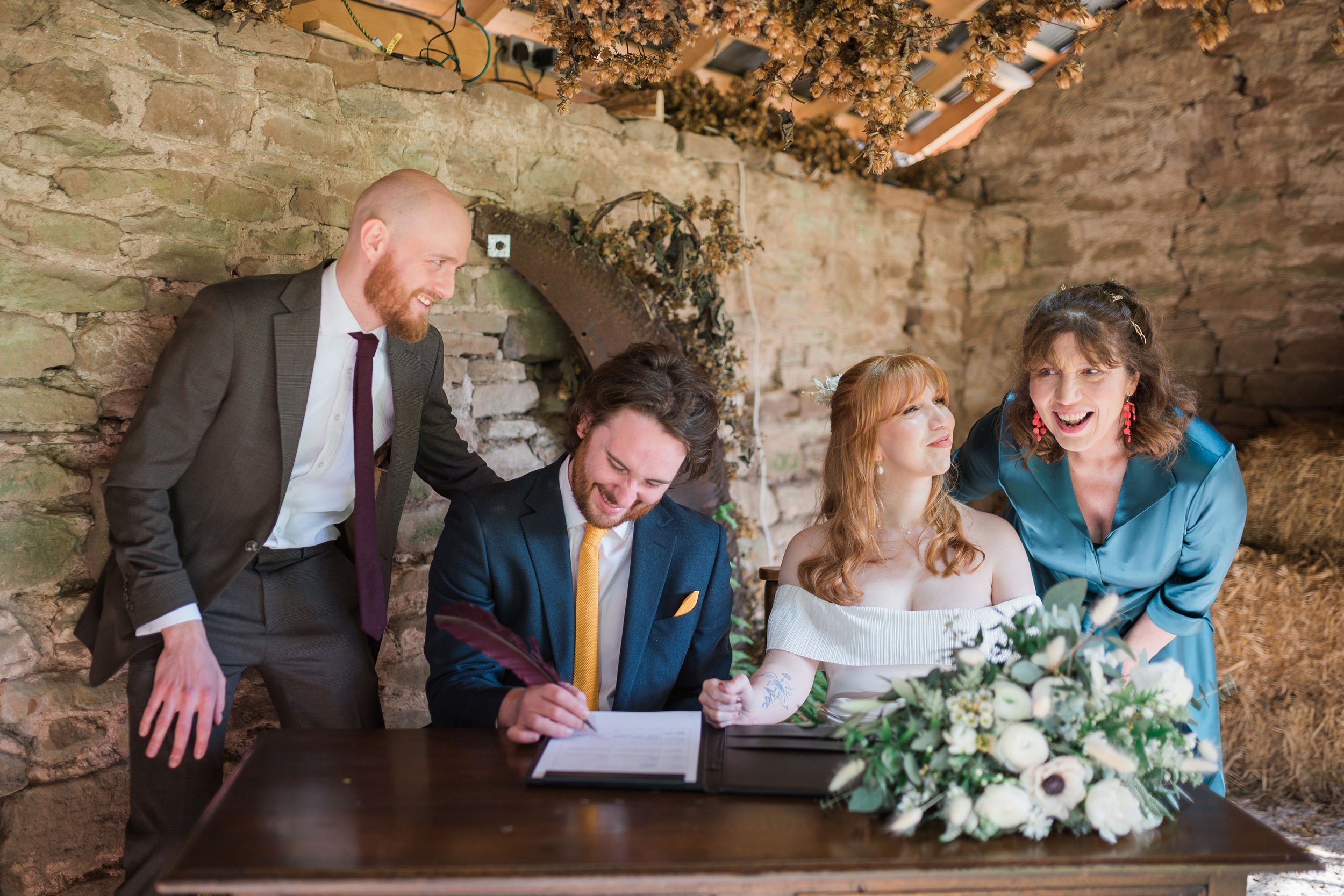 Beautiful bride Ellen wears the Harbour frill dress by British bridal designer Halfpenny London