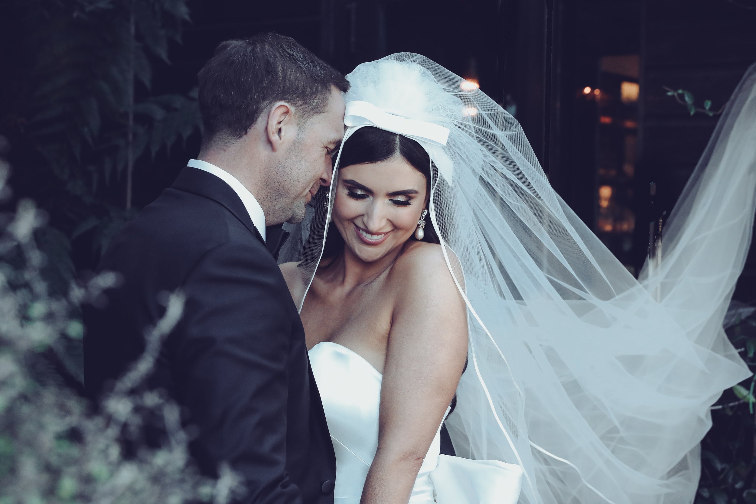 Beautiful bride Ciara wears the Dayton dress and Ariel bow by Halfpenny London