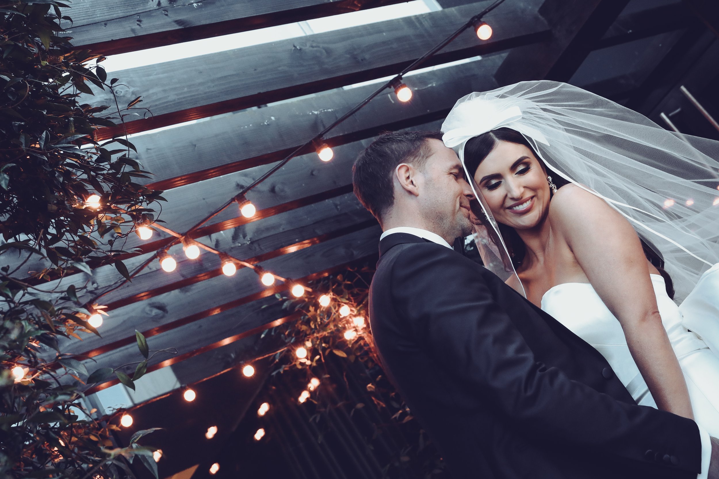 Beautiful bride Ciara wears the Dayton dress and Ariel bow by Halfpenny London