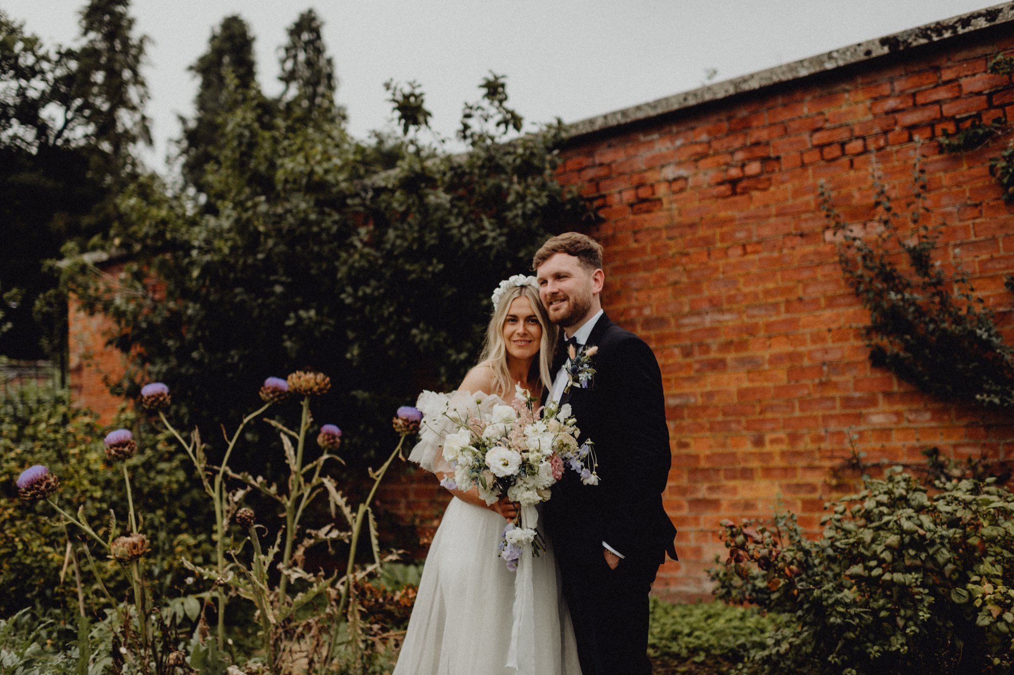 Beautiful bride April wears the Mayfair dress by Halfpenny London