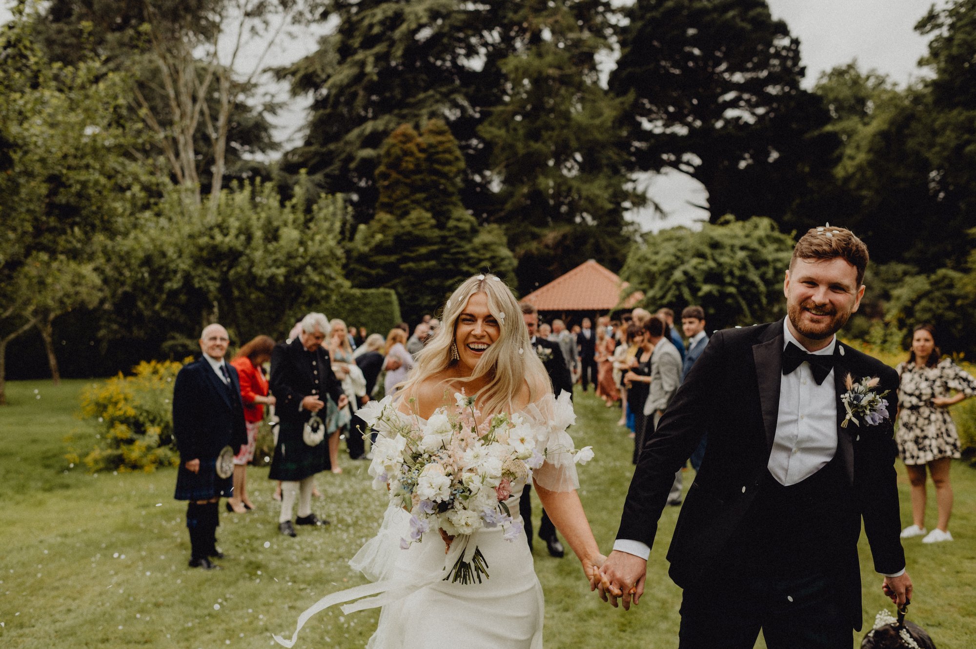 Beautiful bride April wears the Mayfair dress by Halfpenny London