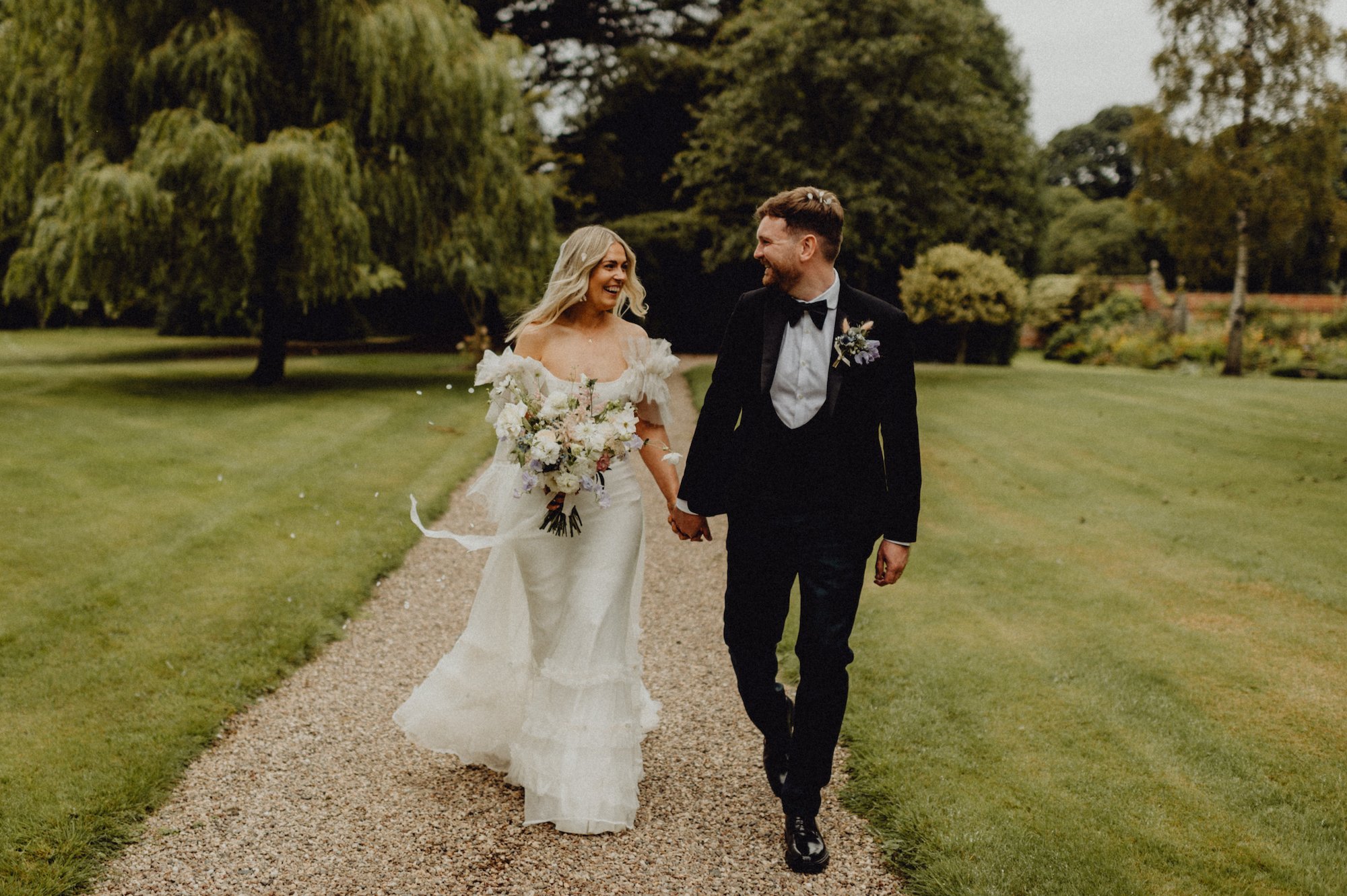 Beautiful bride April wears the Mayfair dress by Halfpenny London