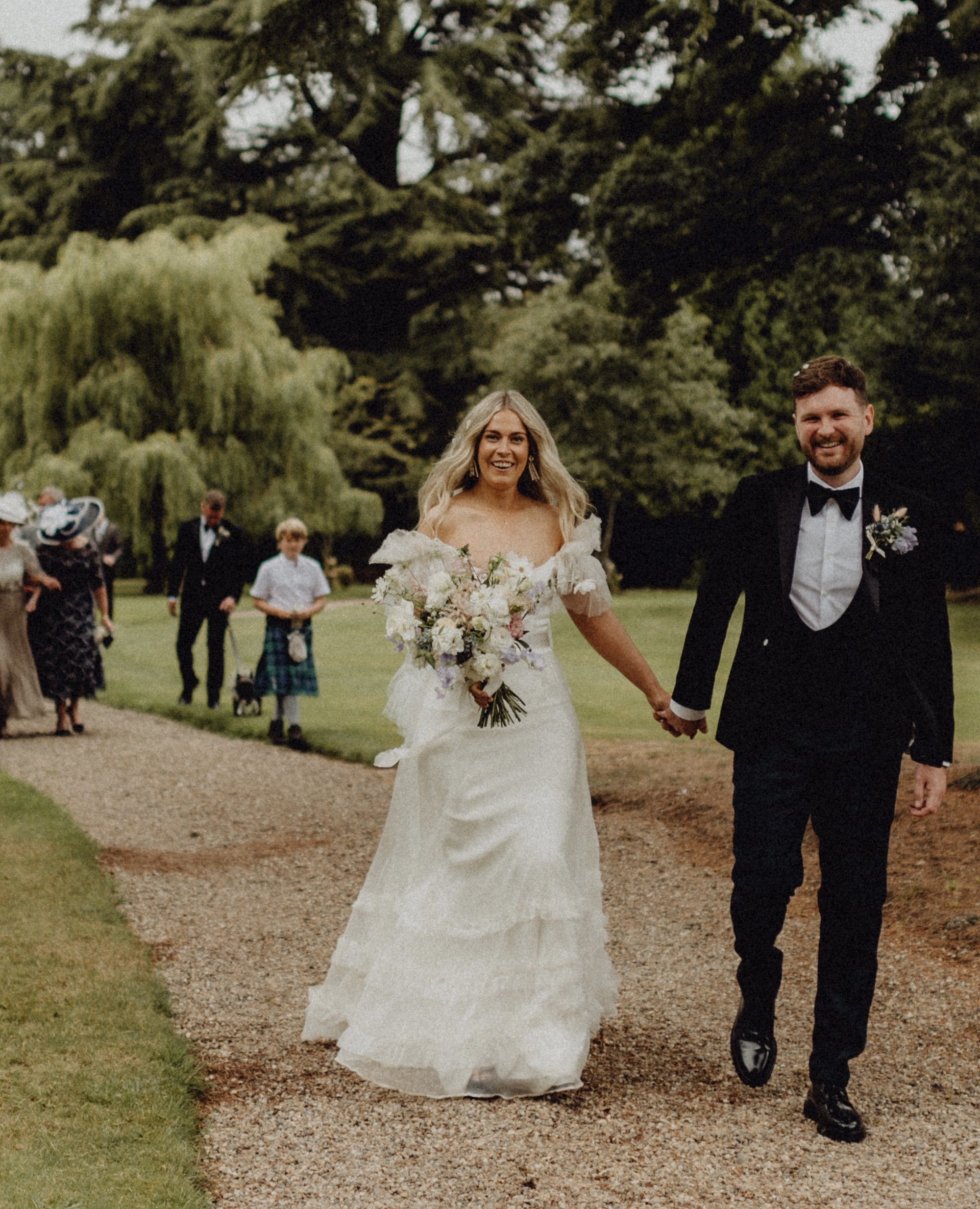 Beautiful bride April wears the Mayfair dress by Halfpenny London