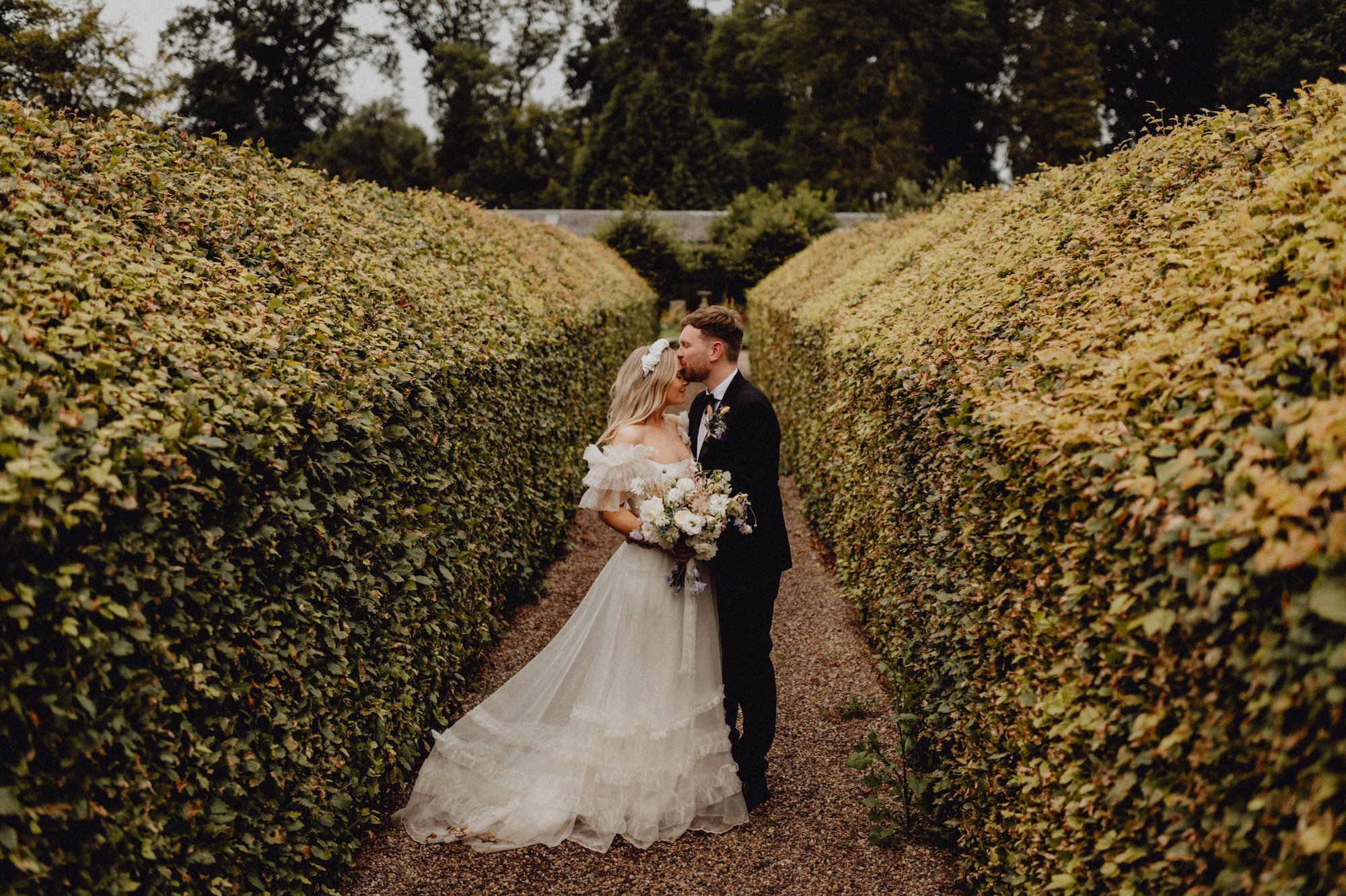 Beautiful bride April wears the Mayfair dress by Halfpenny London