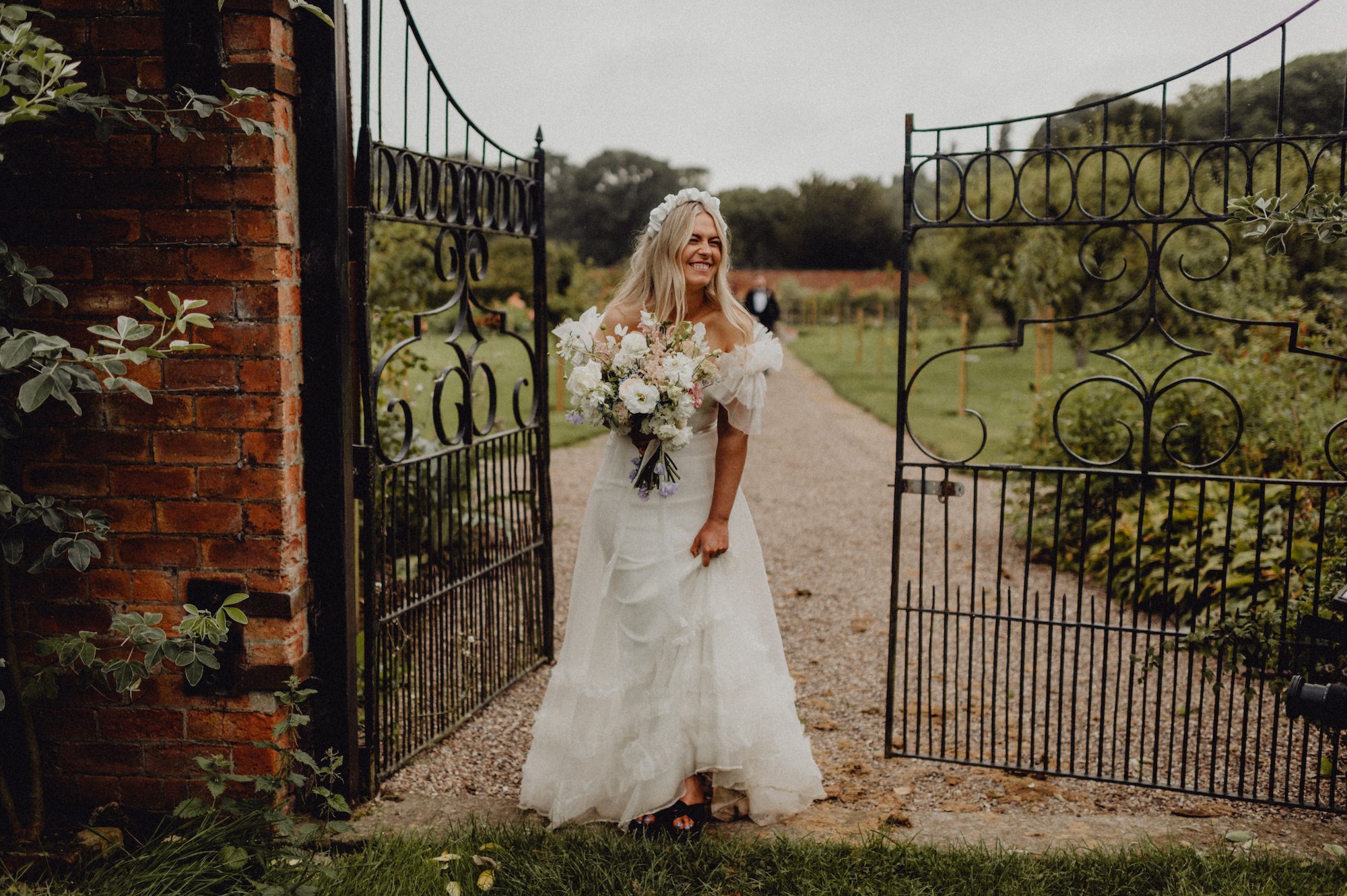 Beautiful bride April wears the Mayfair dress by Halfpenny London