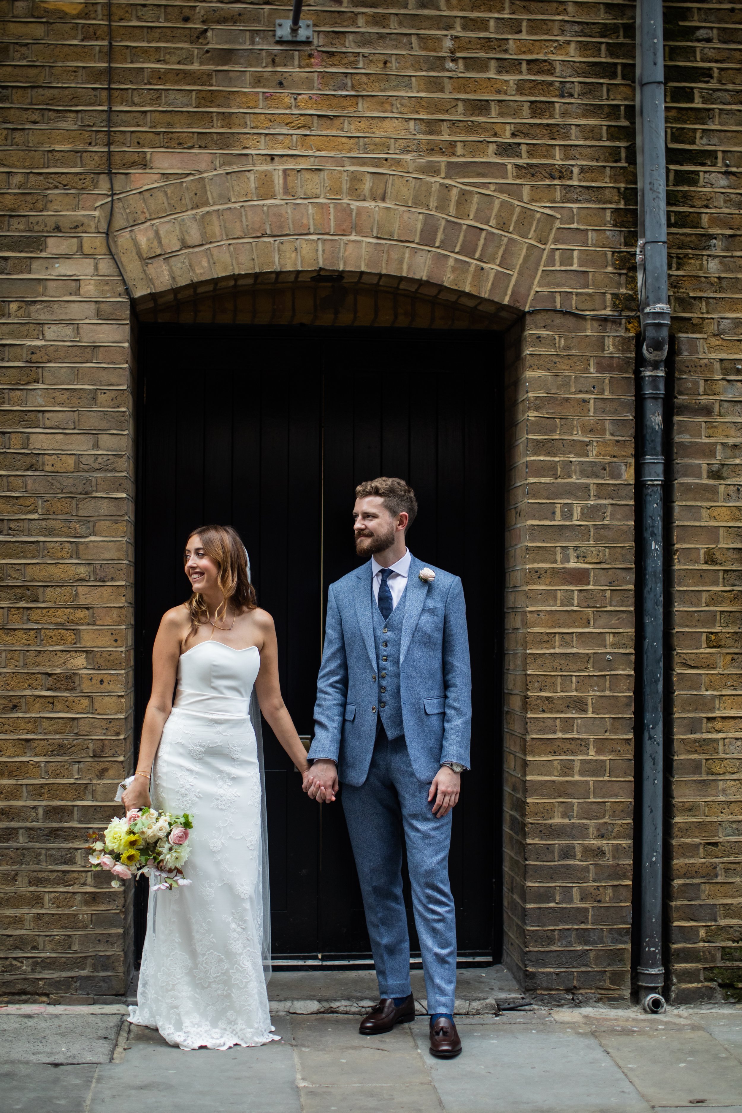 Beautiful bride Yasmin wears the Phillip dress and Charlie skirt from Halfpenny London