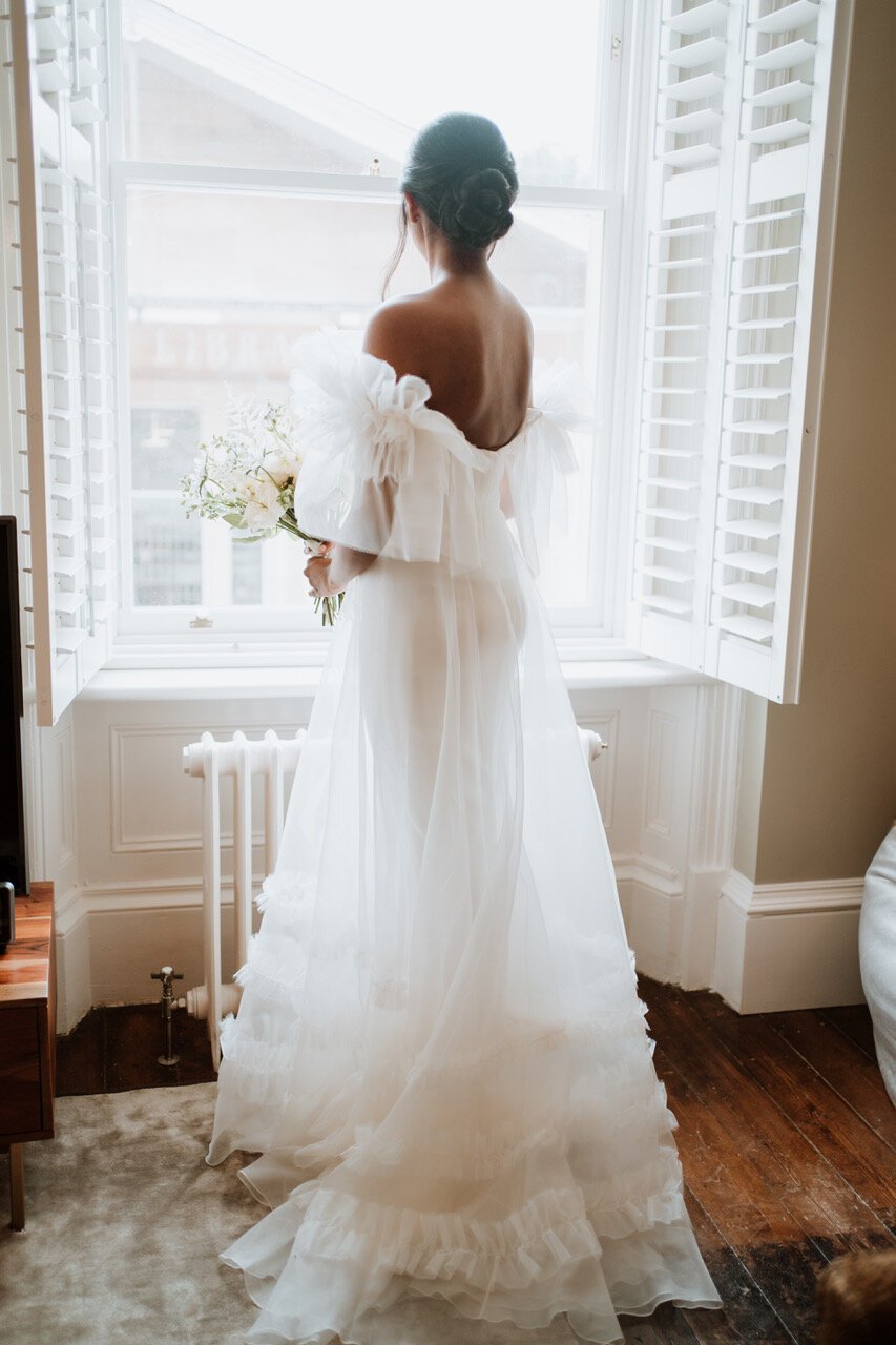 Beautiful bride Tara wore a wedding dress by Halfpenny London