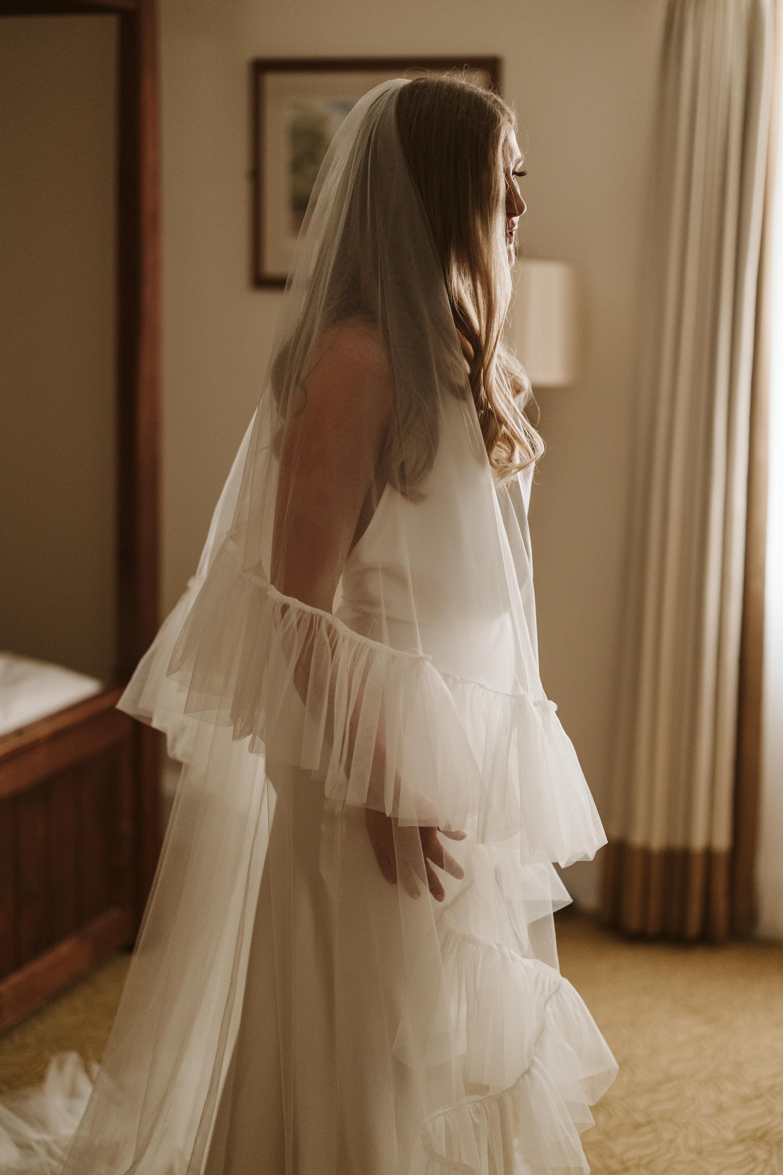 Beautiful bride Katie wore a wedding dress and statement veil by Halfpenny London