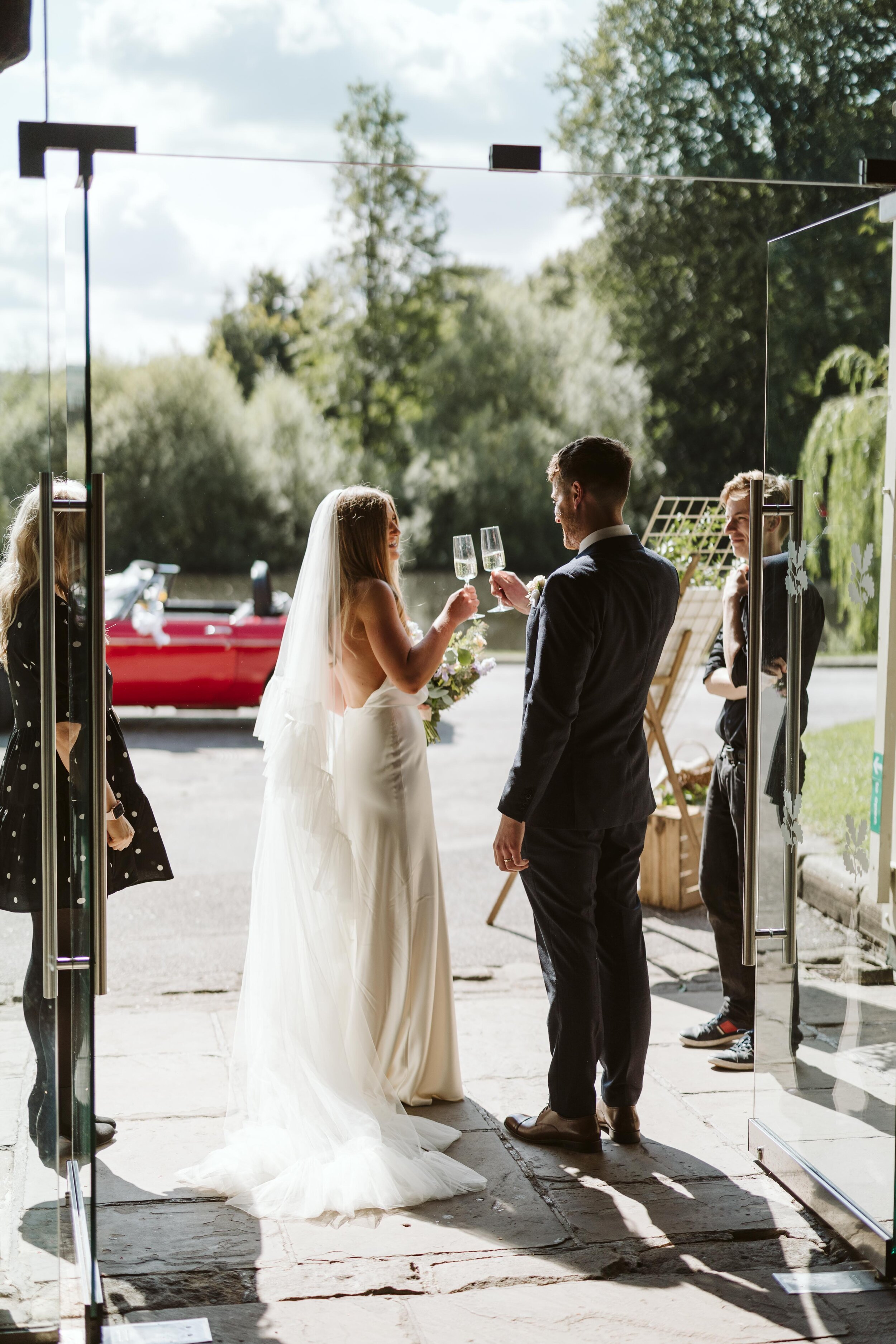 Beautiful bride Katie wore a wedding dress and statement veil by Halfpenny London