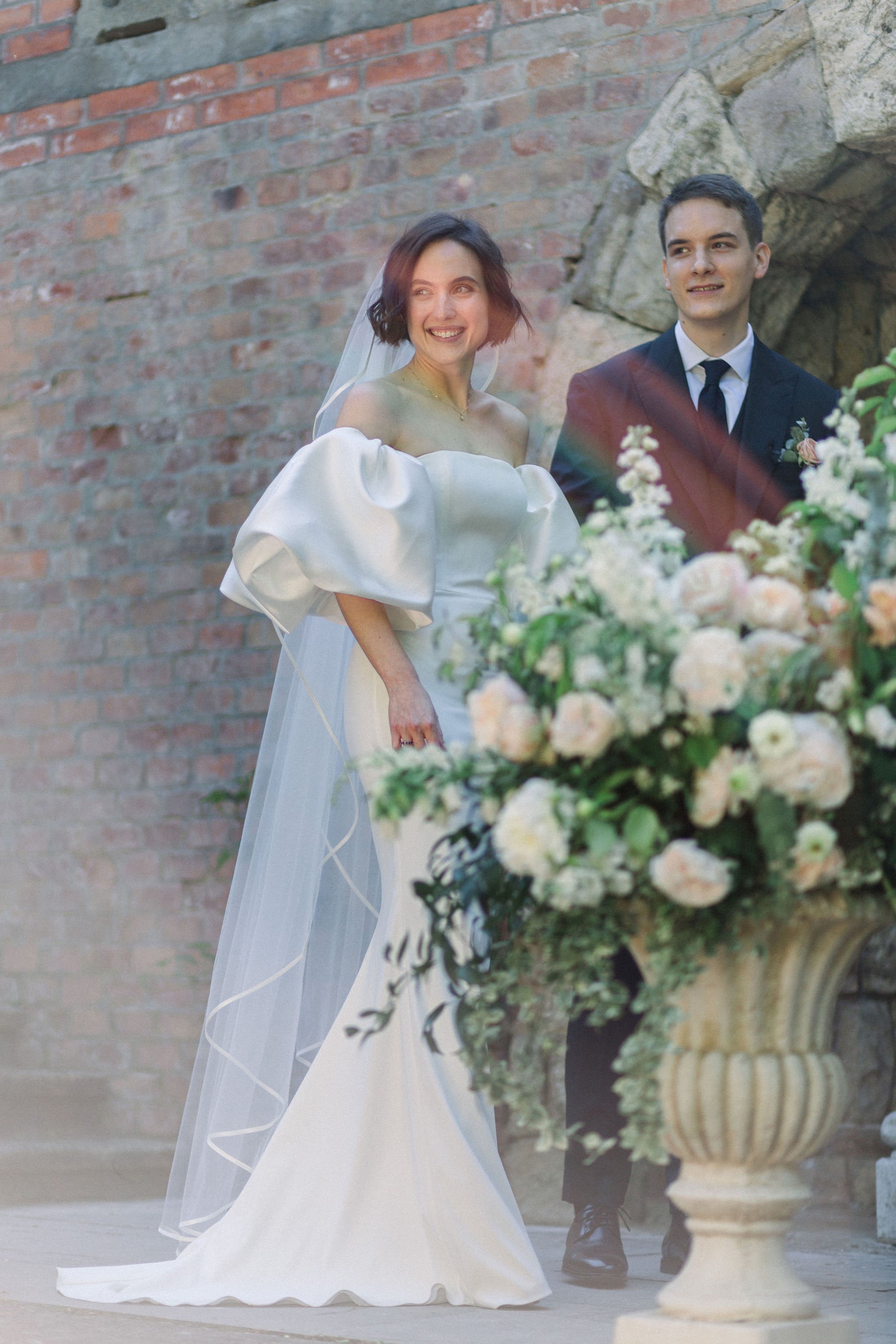 Beautiful bride Mara wore the Oliver wedding dress and Sun sleeves by Halfpenny London