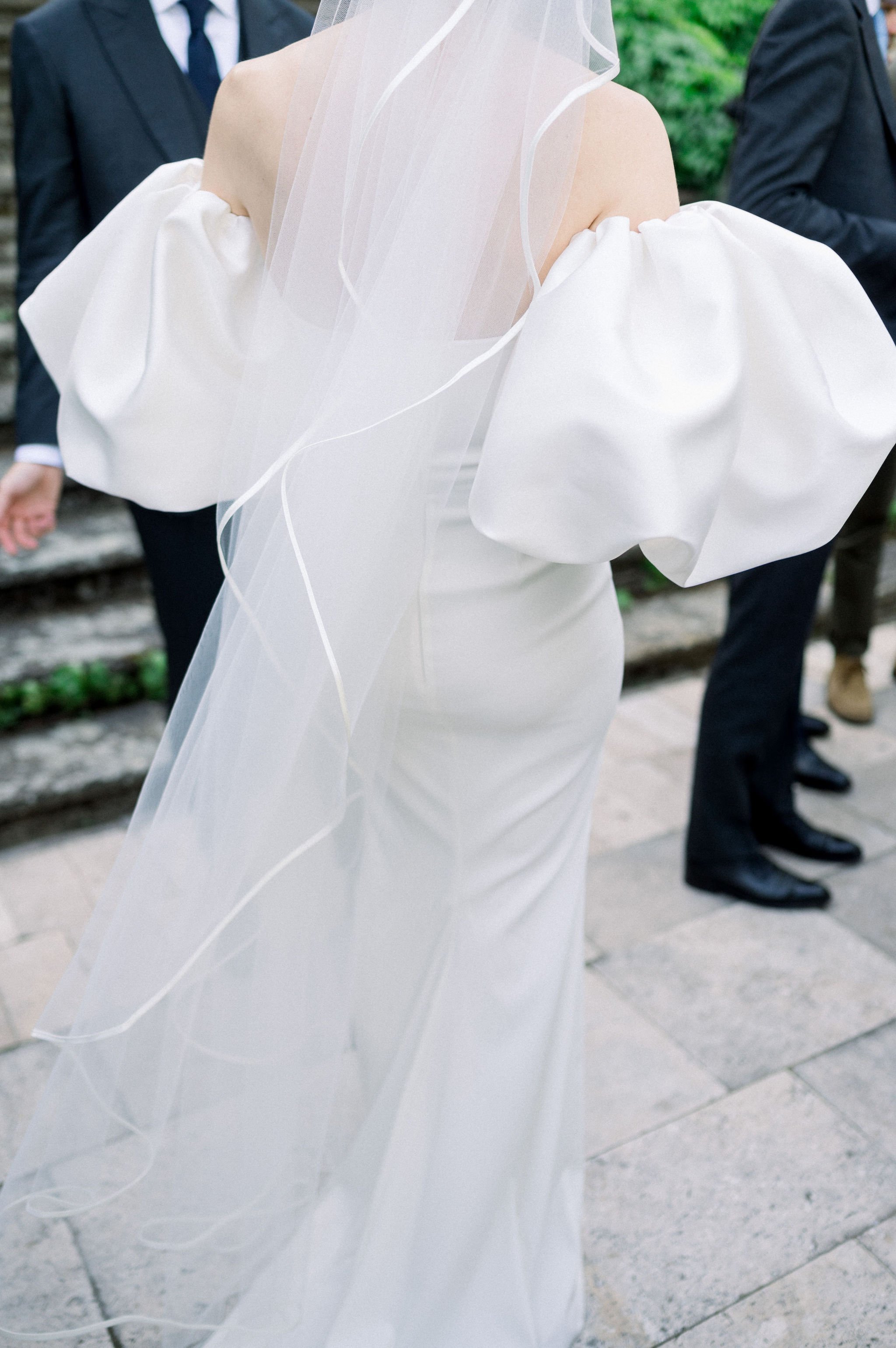 Beautiful bride Mara wore the Oliver wedding dress and Sun sleeves by Halfpenny London