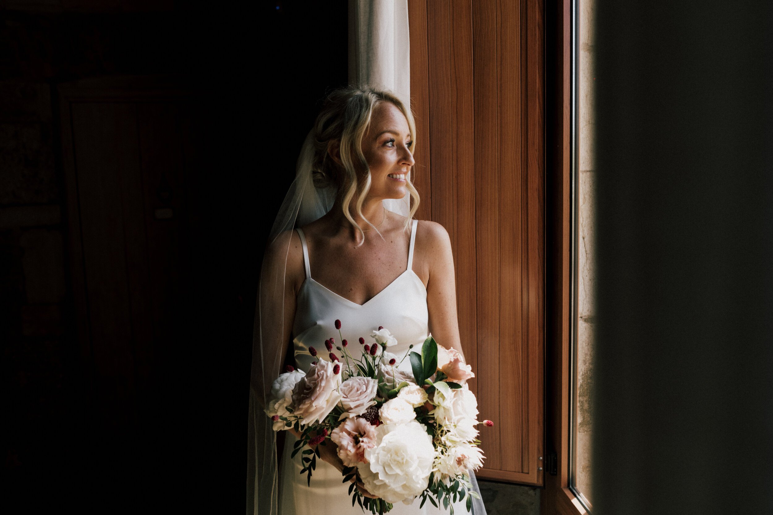 Beautiful bride Lucy wore a wedding dress by Halfpenny London